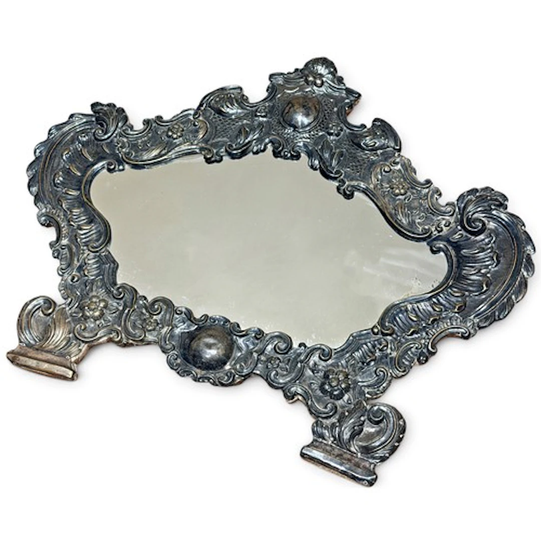 A large easel-backed dressing mirror in the Rococo sale with...