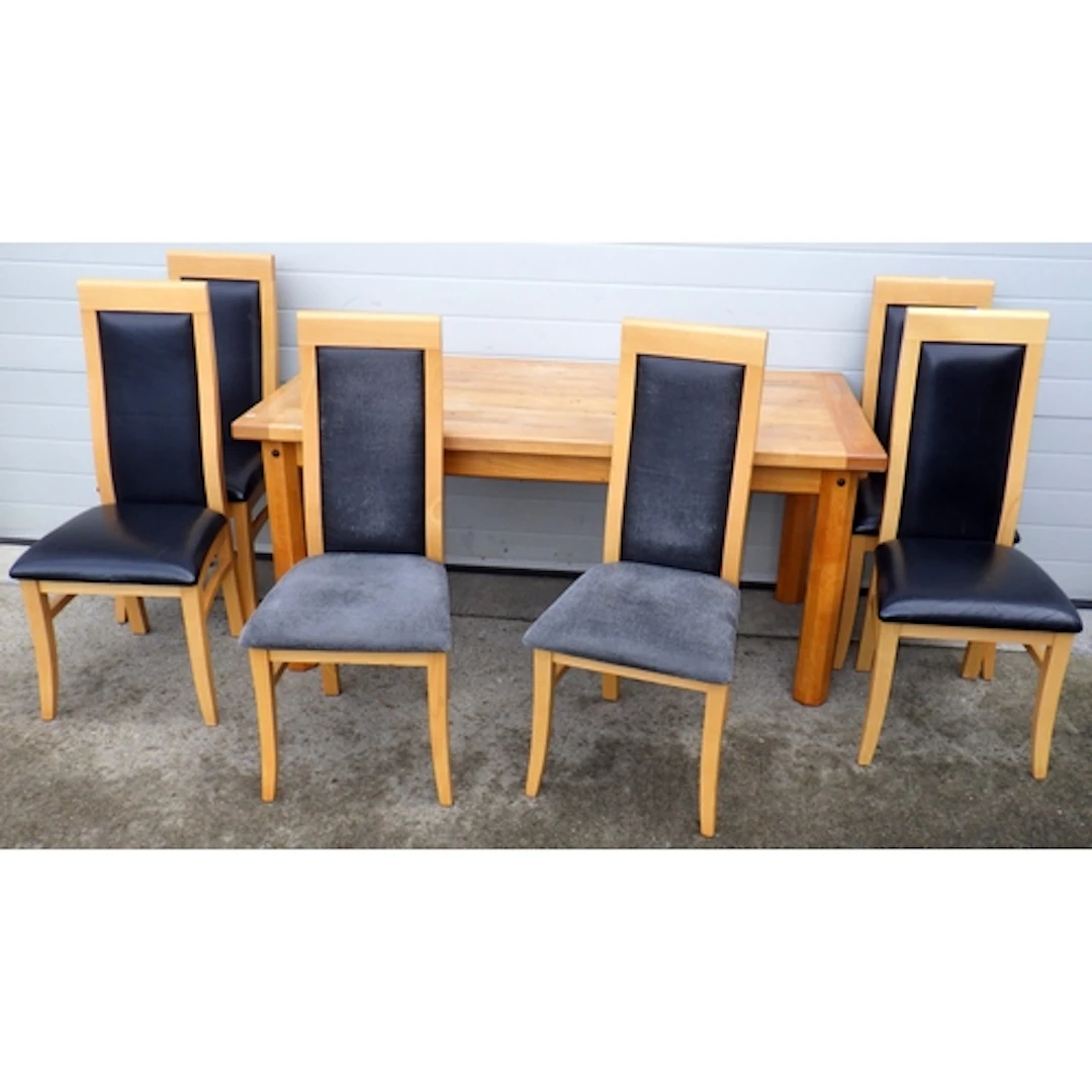 A modern dining table with six upholstered chairs (a/f)
