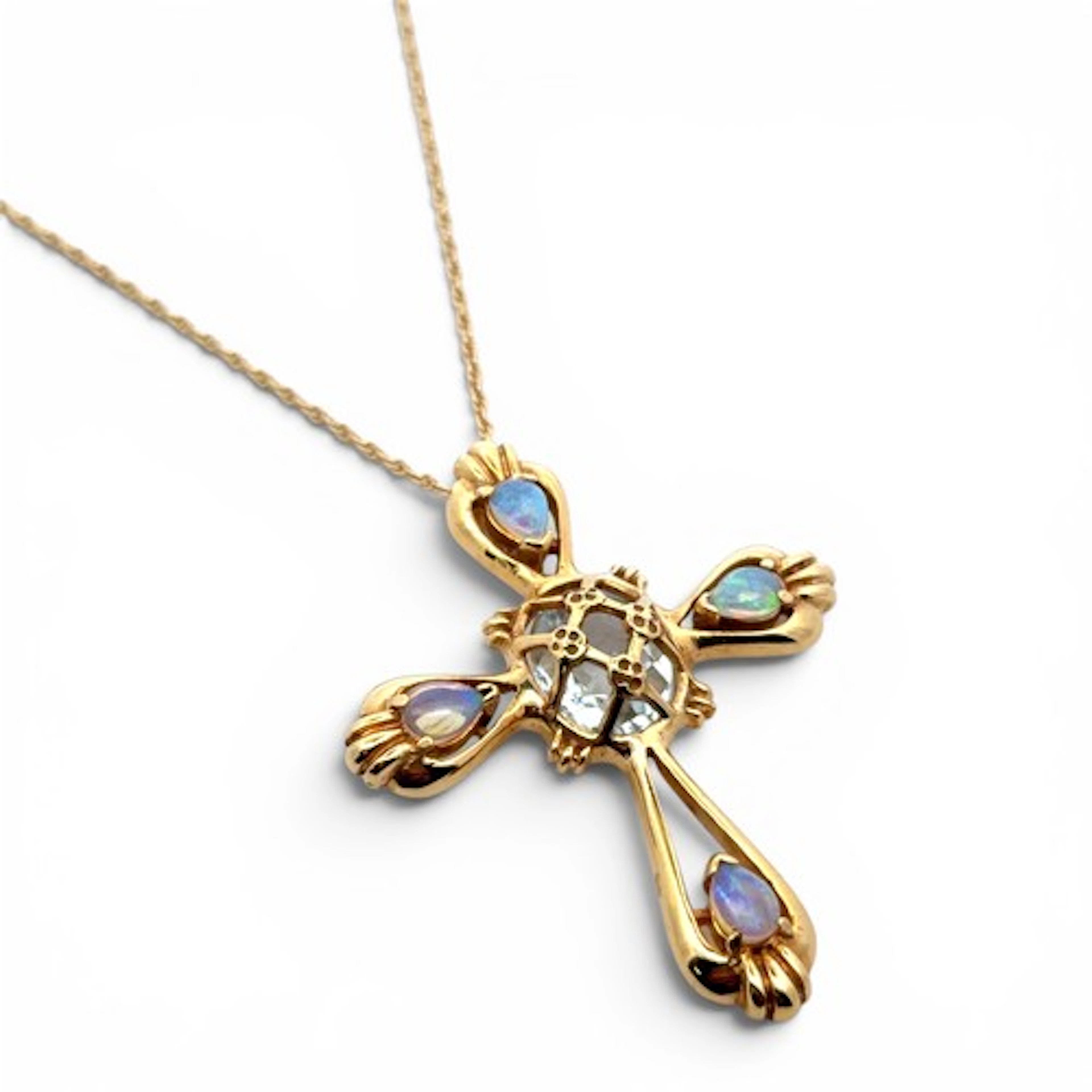 Franklin Mint 'Coppini Jewelled Cross', a 14ct gold cross pe...