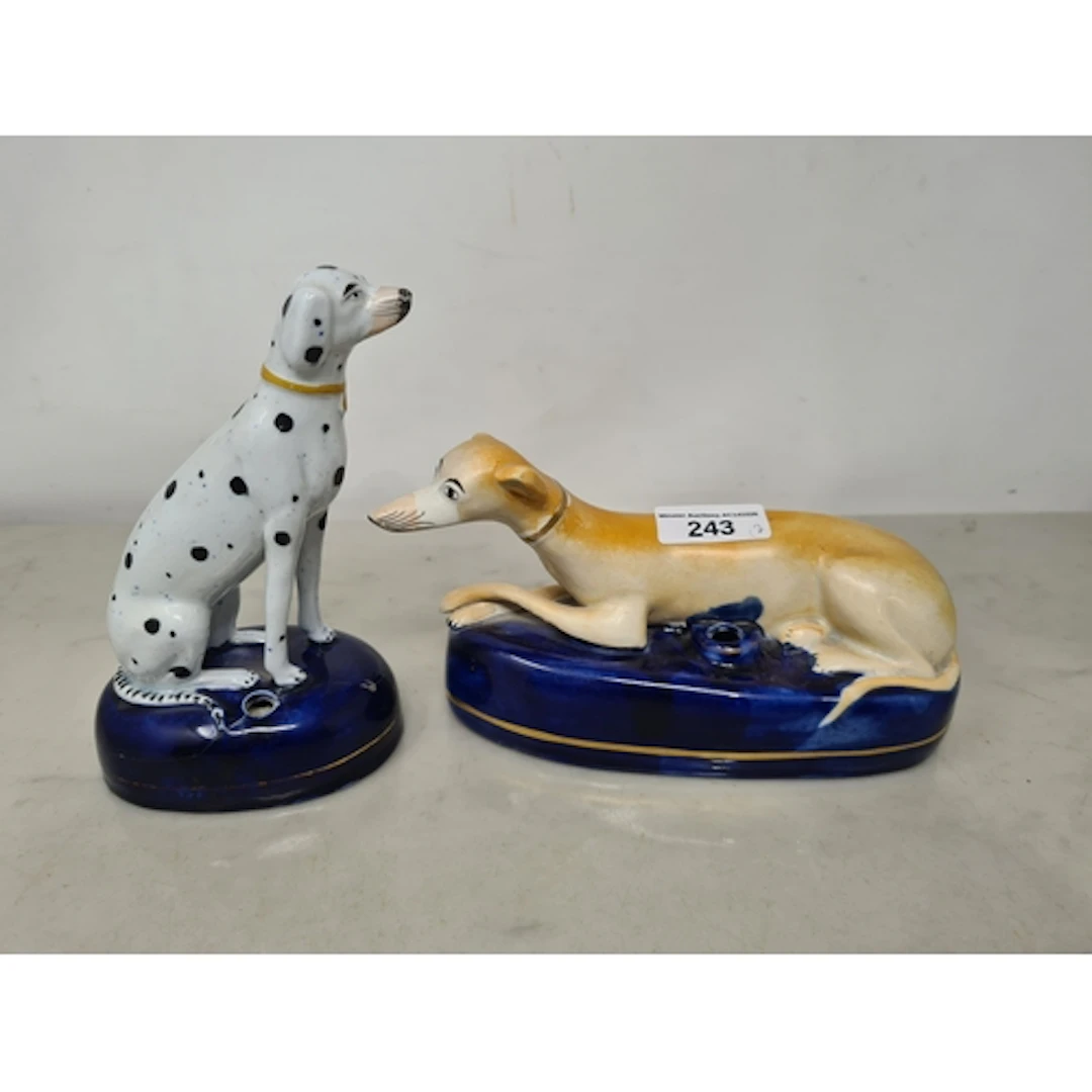 A Staffordshire Pen Holder in the form of a reclining greyho...