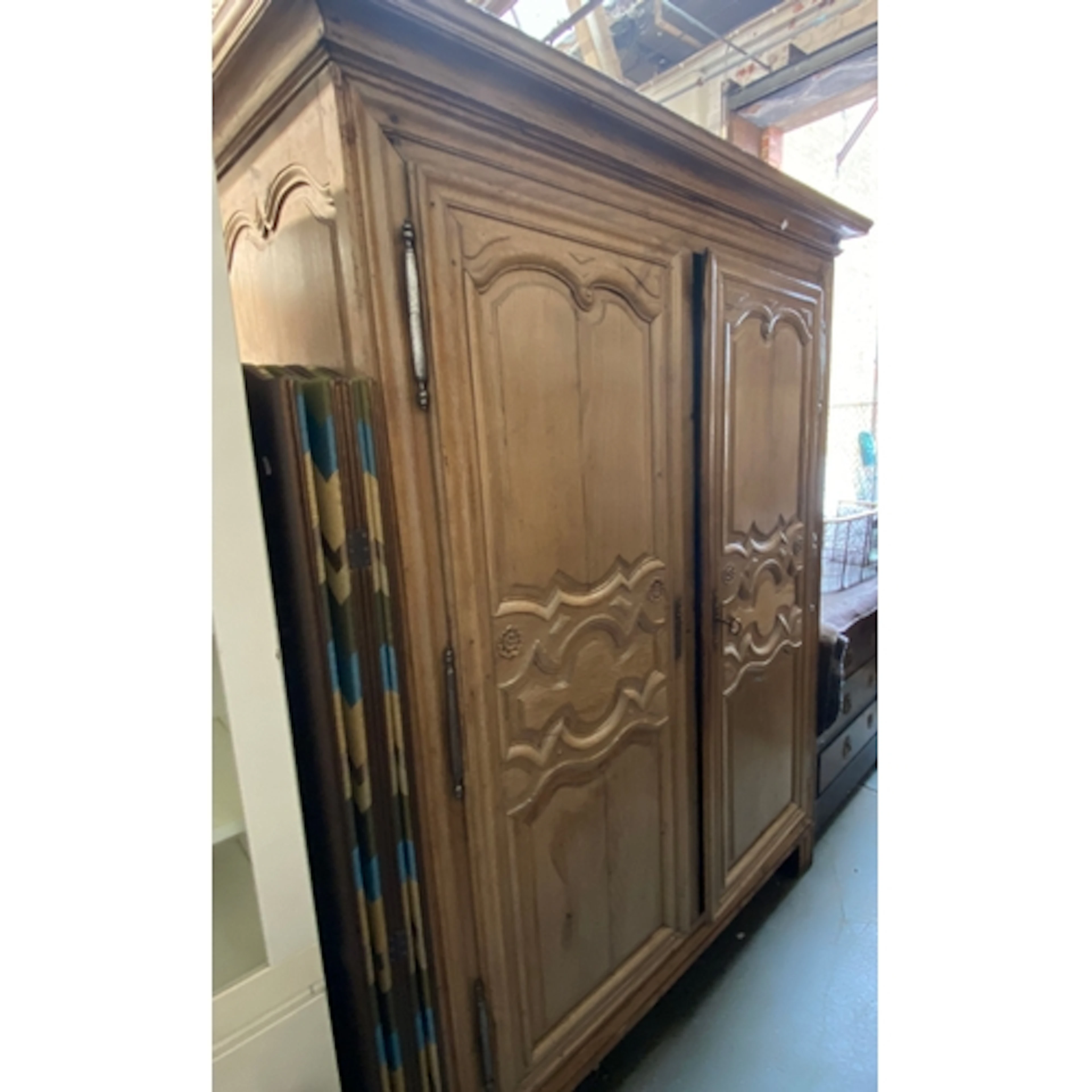 A large French oak armoire, 19th century, with moulded pedim...