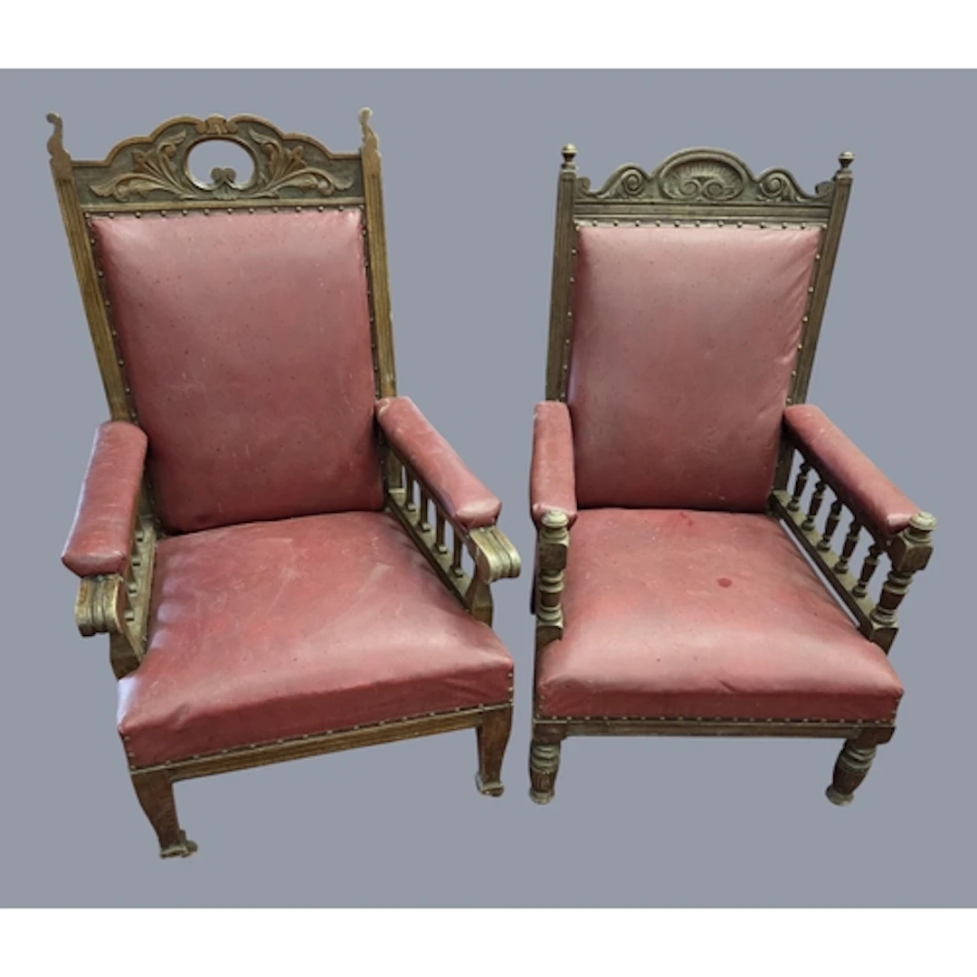 A His and Hers late 19th Century Oak showframe Armchairs.