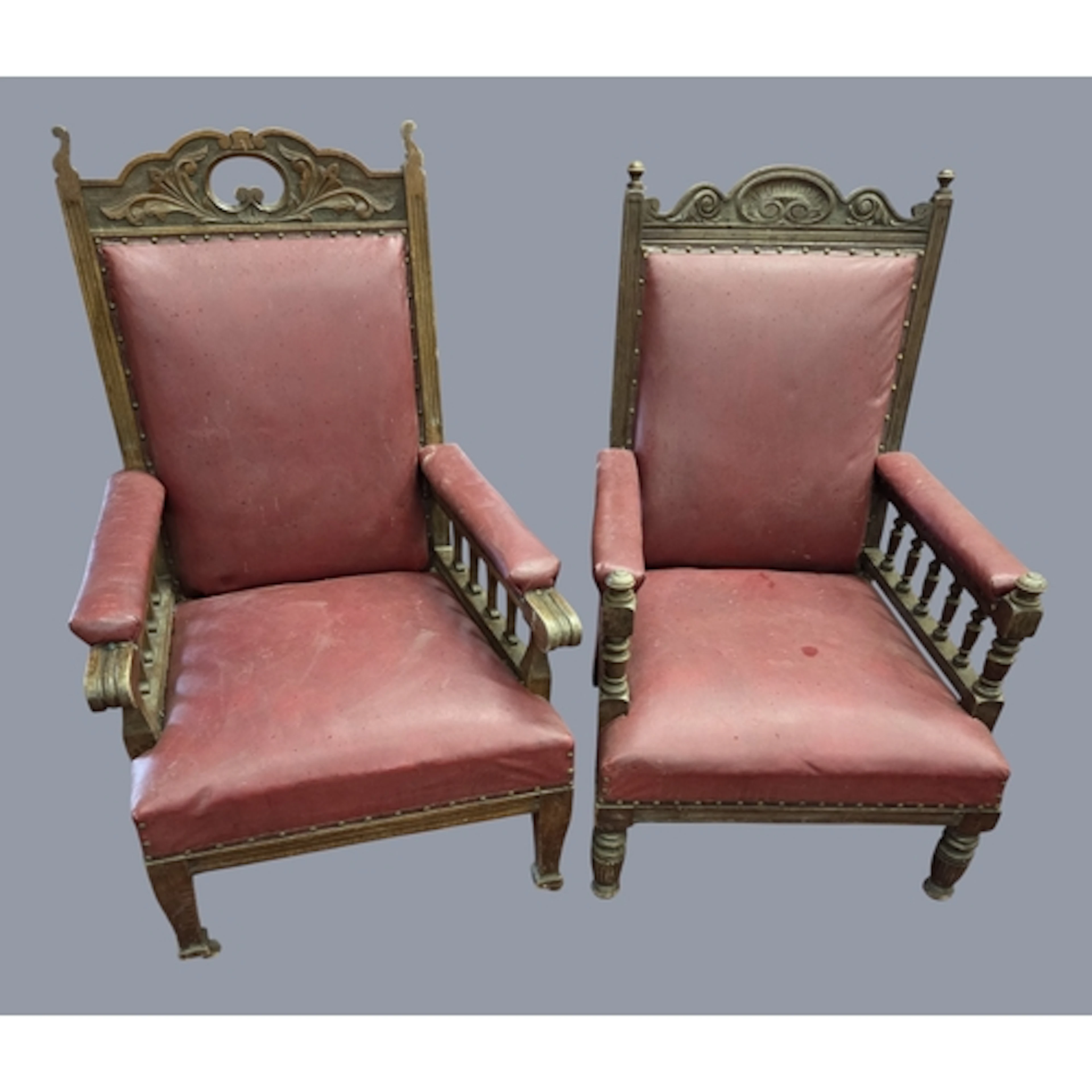 A His and Hers late 19th Century Oak showframe Armchairs.