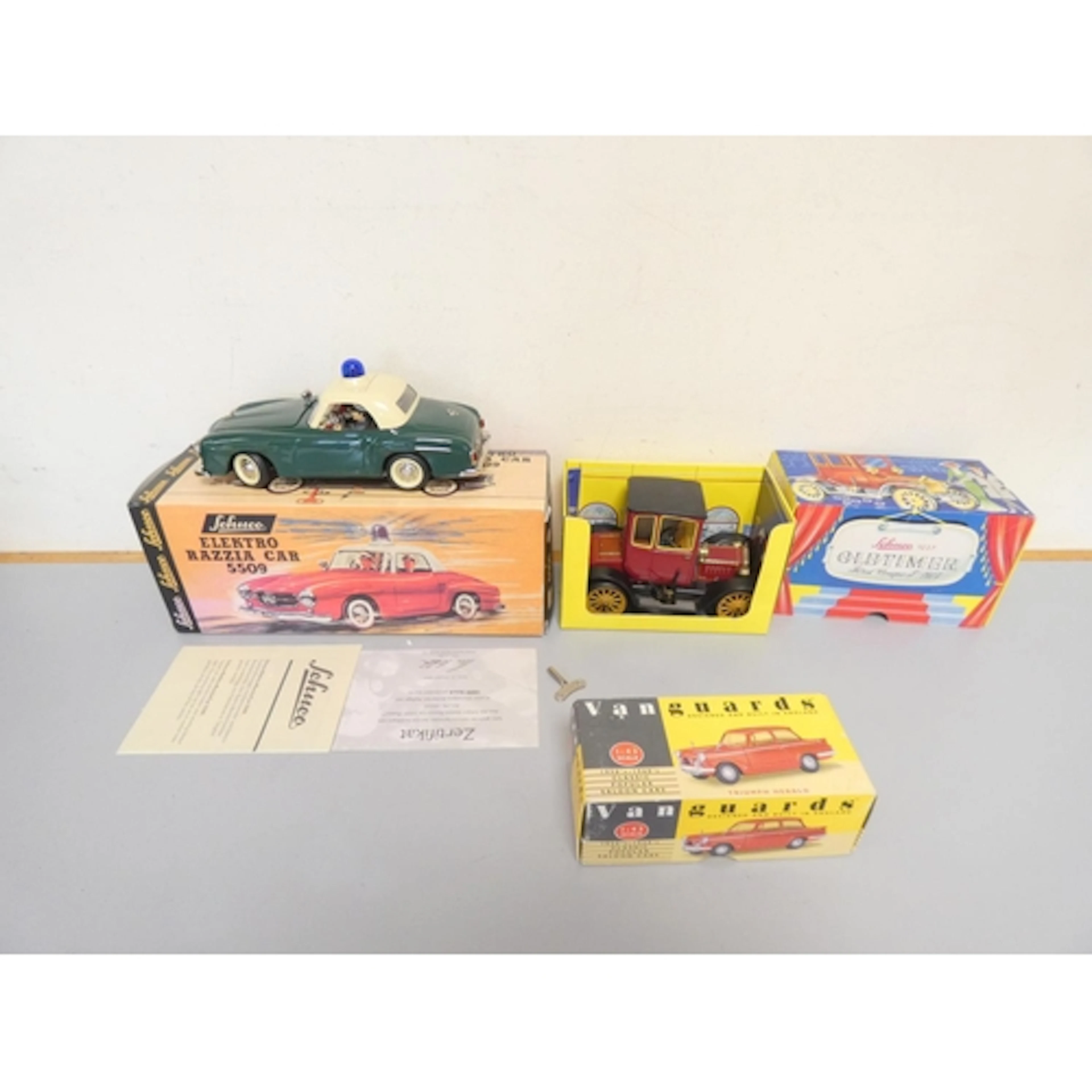 Group of die-cast model toys to include a re-issued Schuco E...