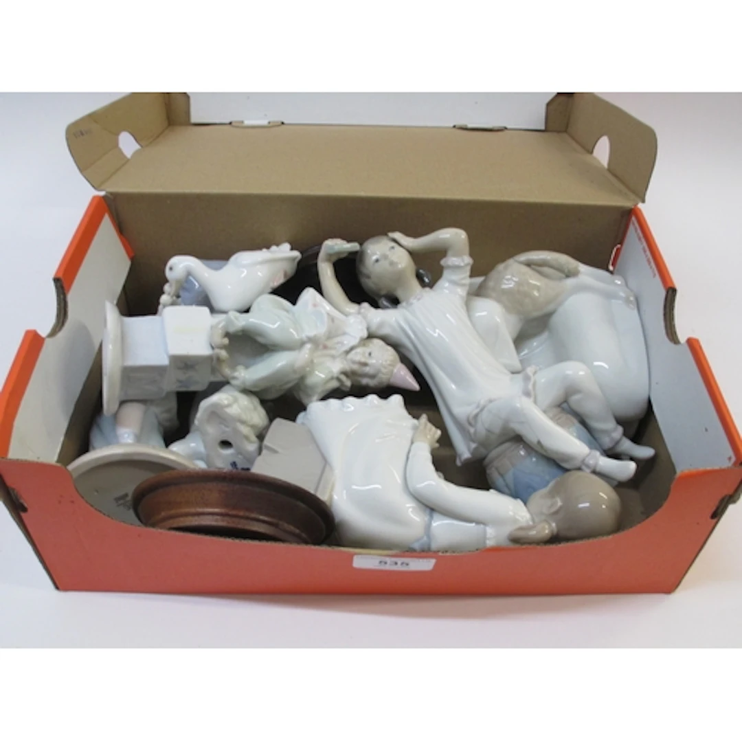 Box containing a small quantity of Lladro, Nao, and other si...