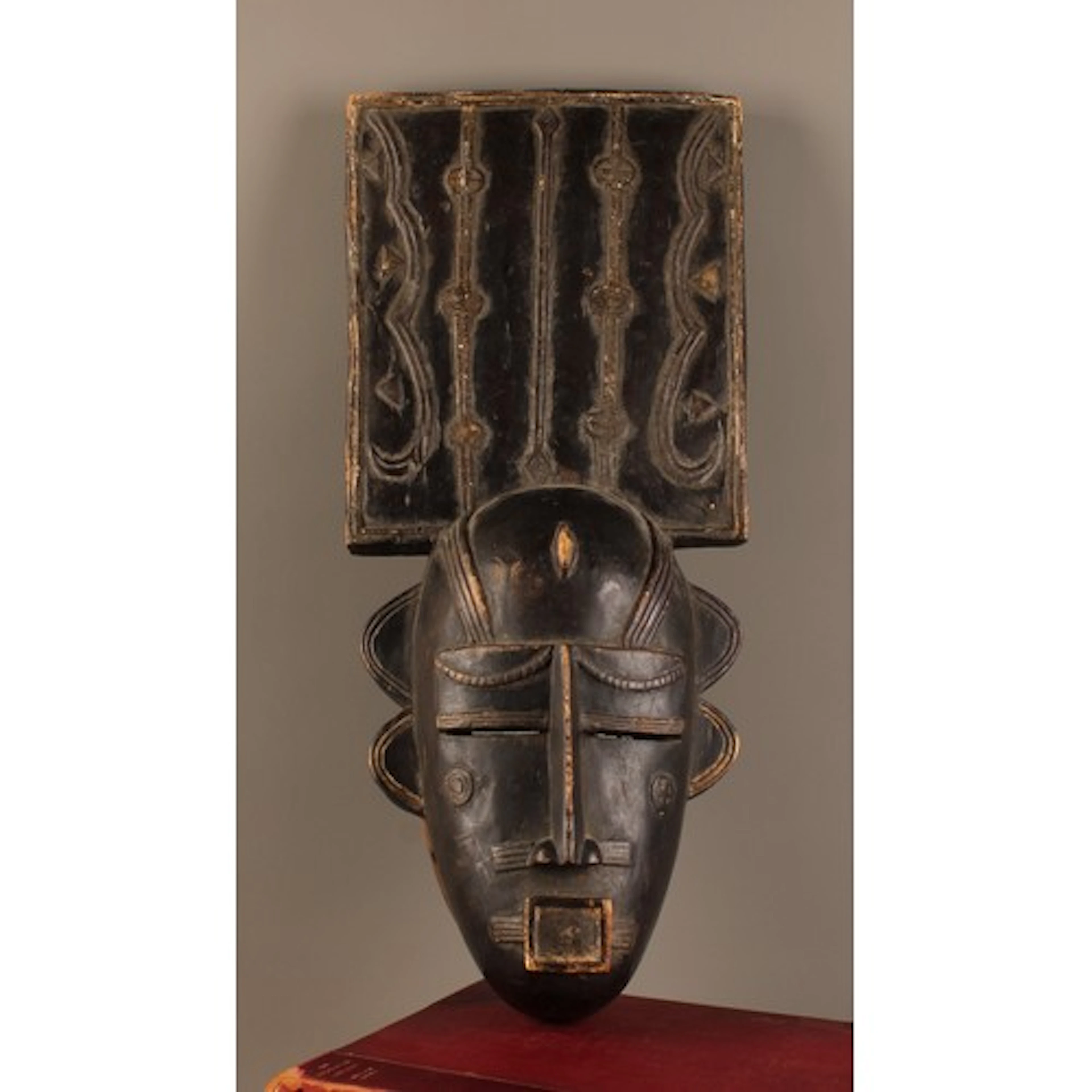 Tribal art - a Ligbi mask, typically with rectangular protru...