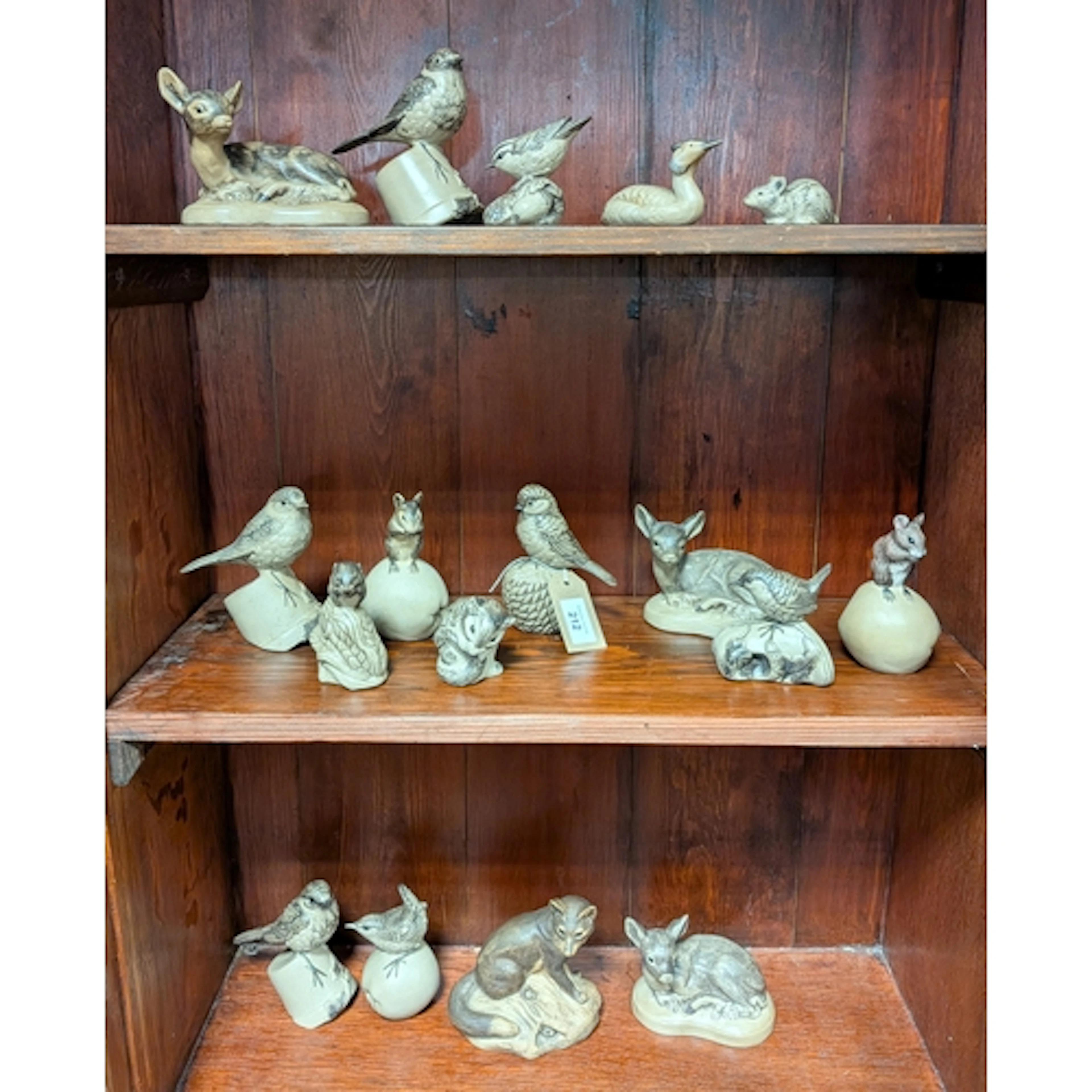 A large collection of Poole Pottery stoneware figures and sm...