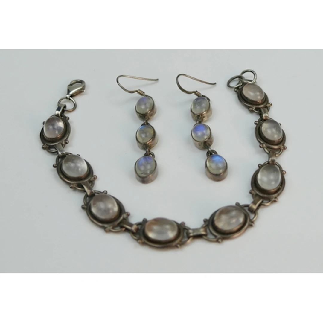 A silver mounted moonstone bracelet, 18.5cm long, together w...