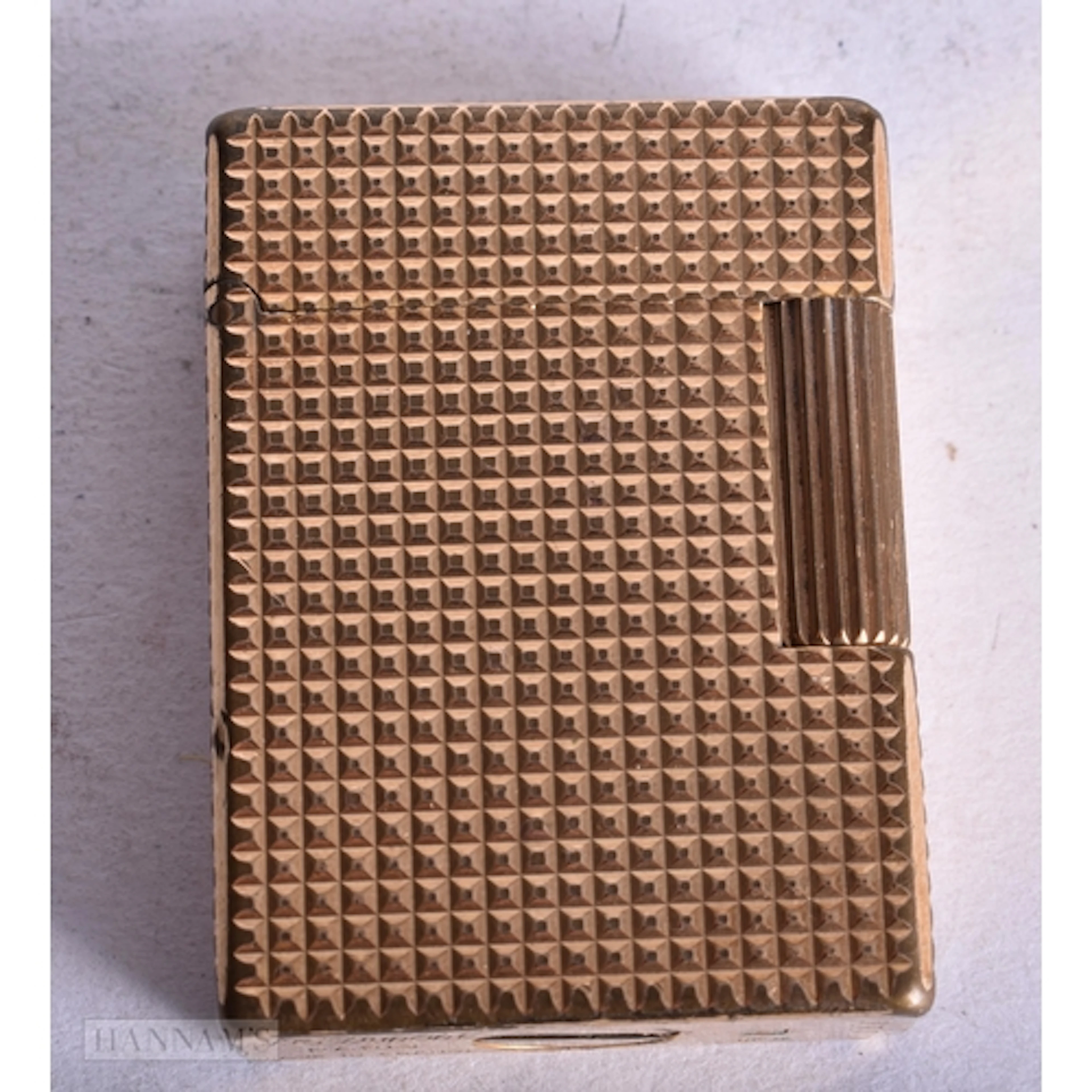 An ST Dupont Gold Plated Pocket Lighter with Hobnail Pattern...
