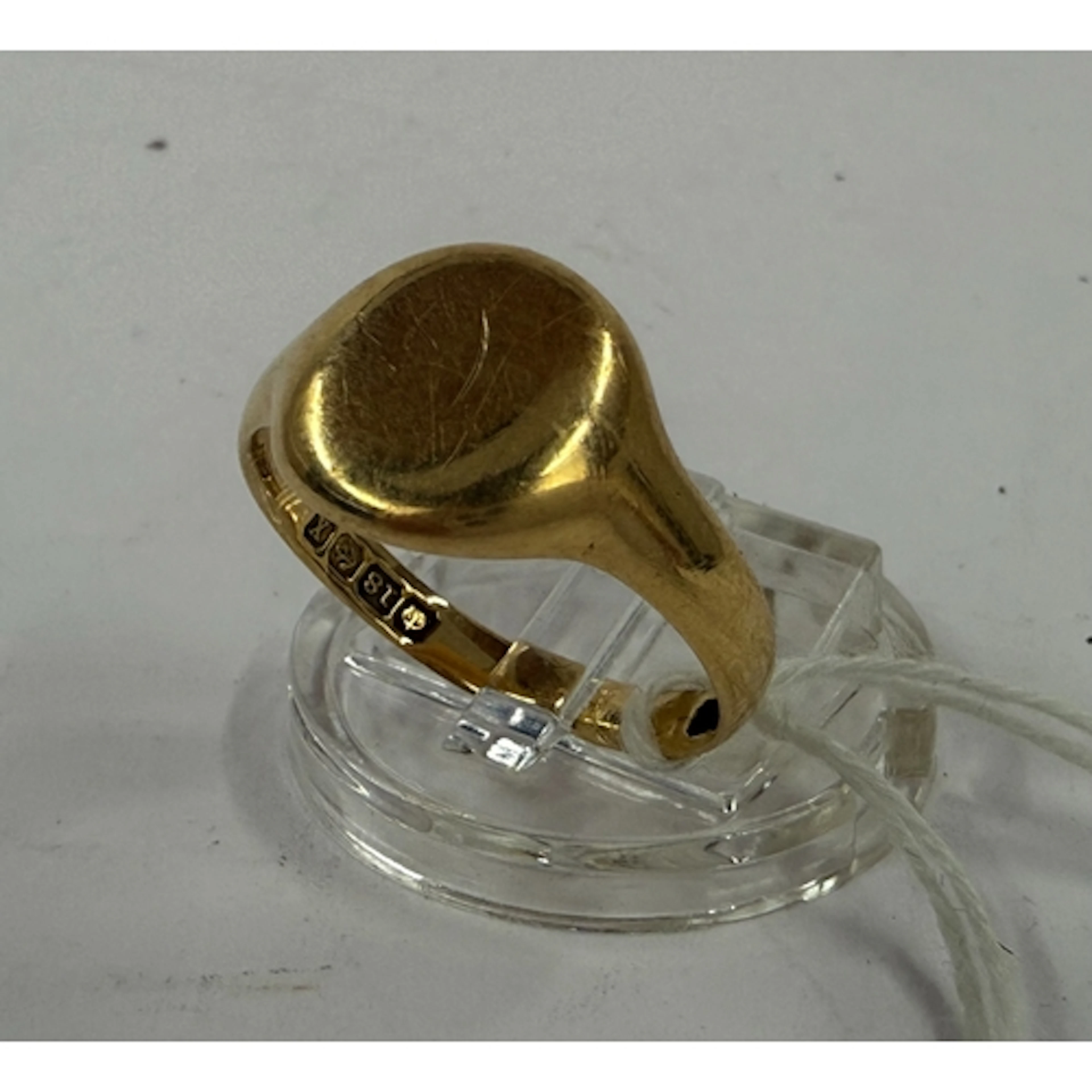 Jewellery: an 18ct yellow gold signet ring, Birmingham 1922,...