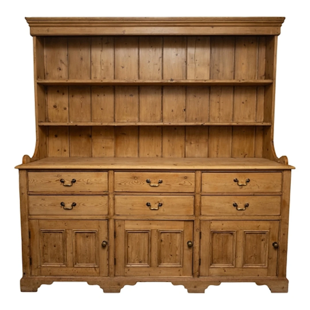 A substantial pine kitchen dresser, early 20th century; the ...