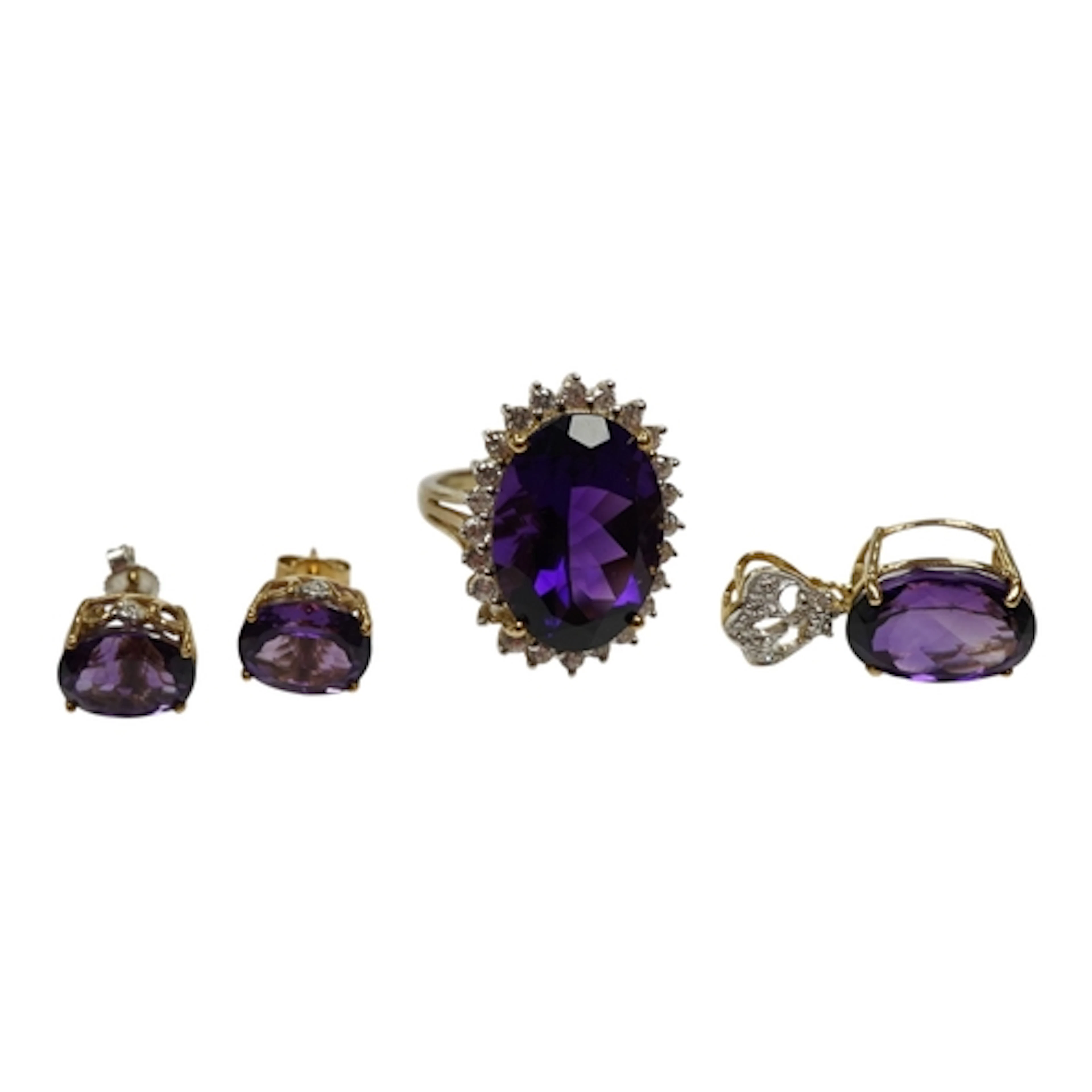 A recent 9ct gold, amethyst and simulated diamond set oval c...