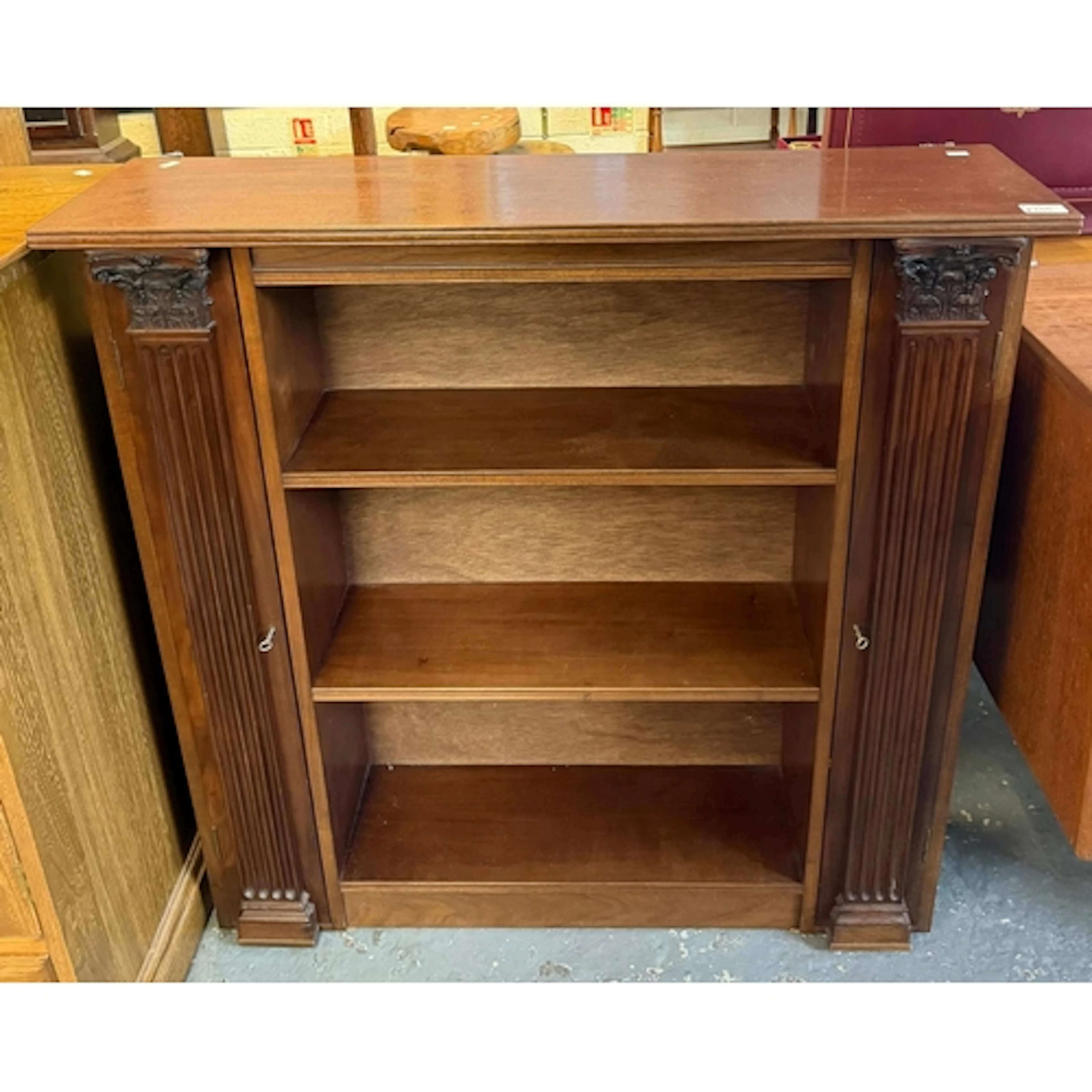 Reproduction mahogany open bookshelves with Corinthian Colum...