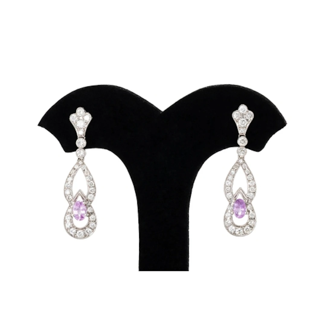 A PAIR OF PINK SAPPHIRE AND DIAMOND DROP EARRINGS, of open w...