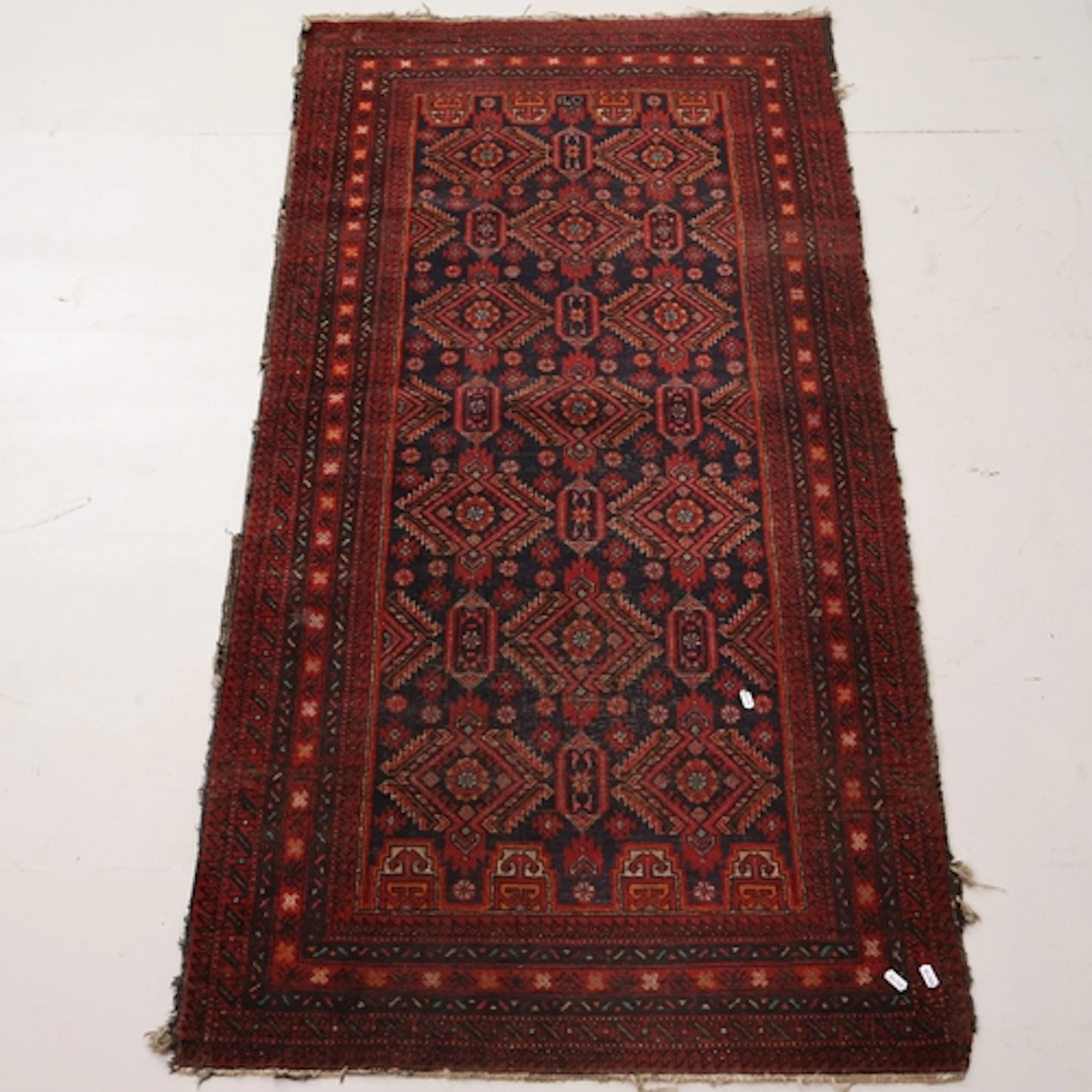A red ground Afghan Bokhara rug, L174cm, W85cm.
