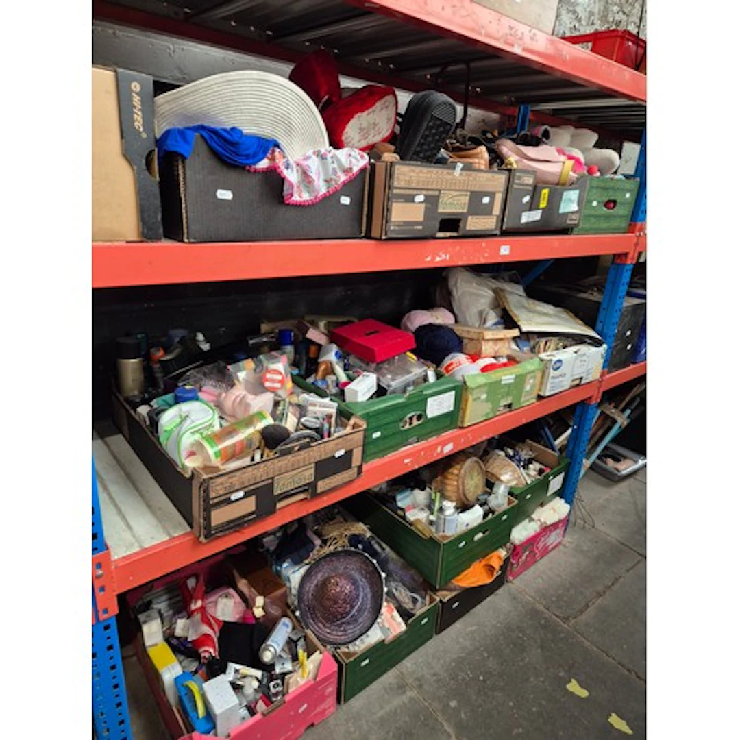 14 boxes of mixed items to include shoes, handbags, towels, ...