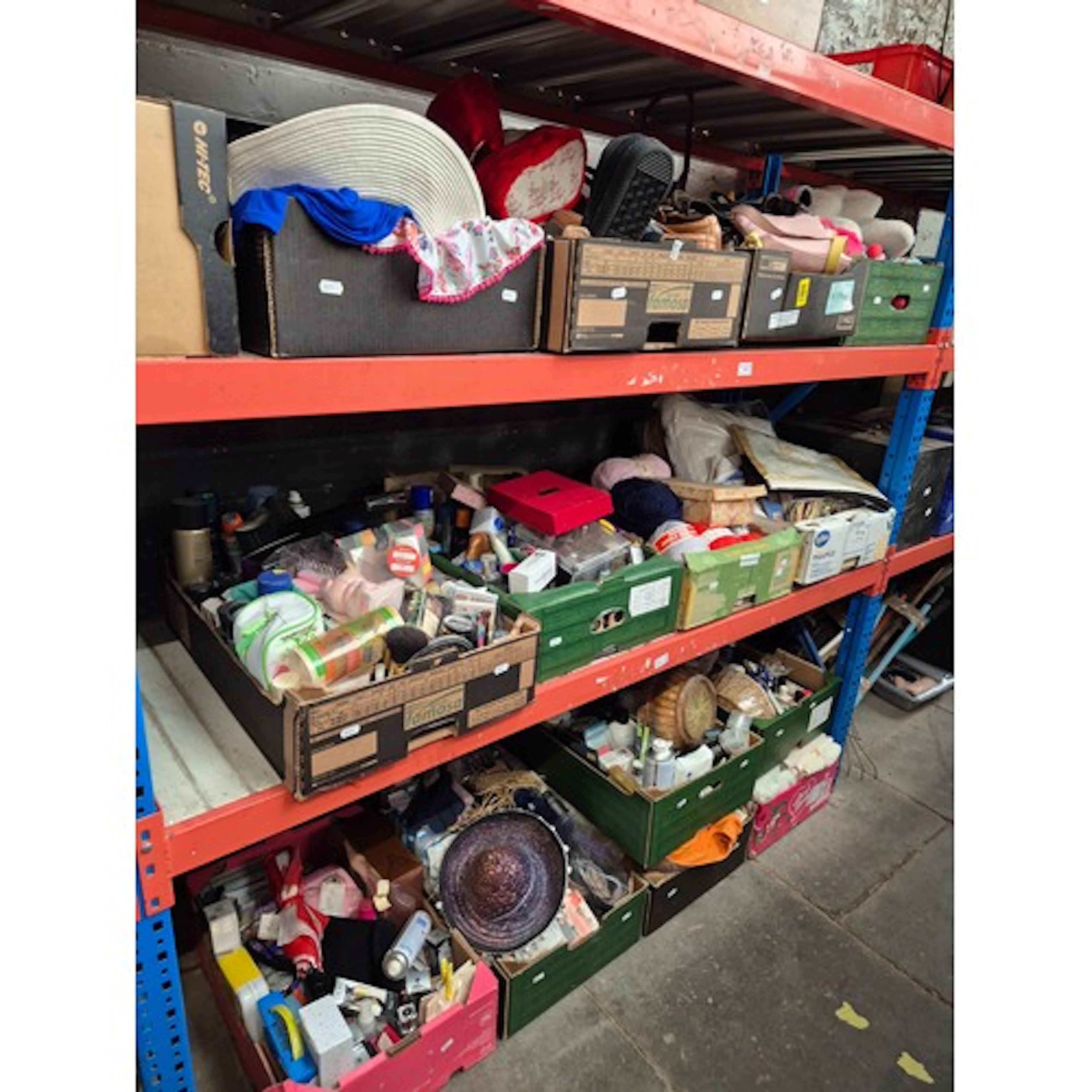 14 boxes of mixed items to include shoes, handbags, towels, ...