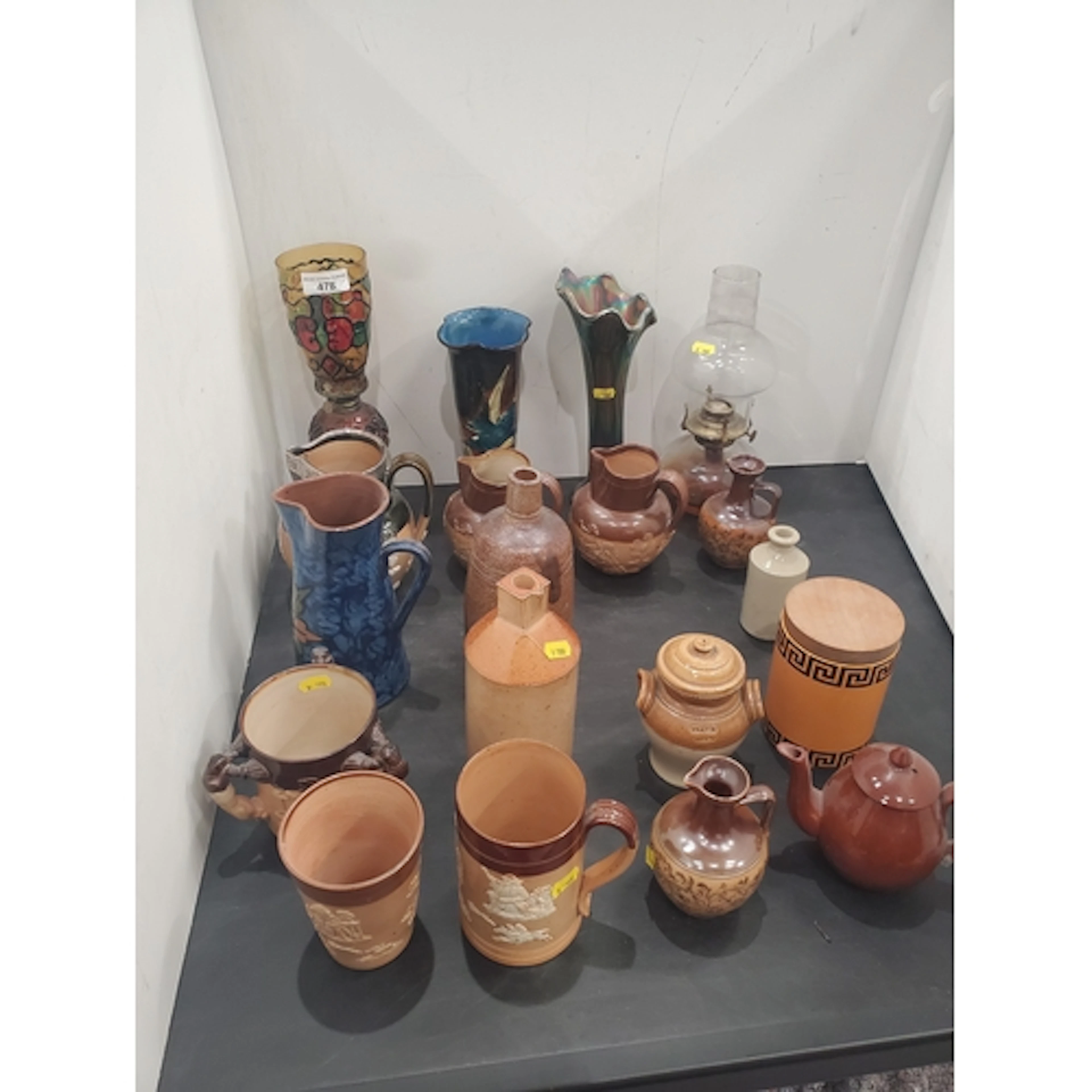 A collection of Doulton Lambeth stoneware Jugs, Tankard, thr...