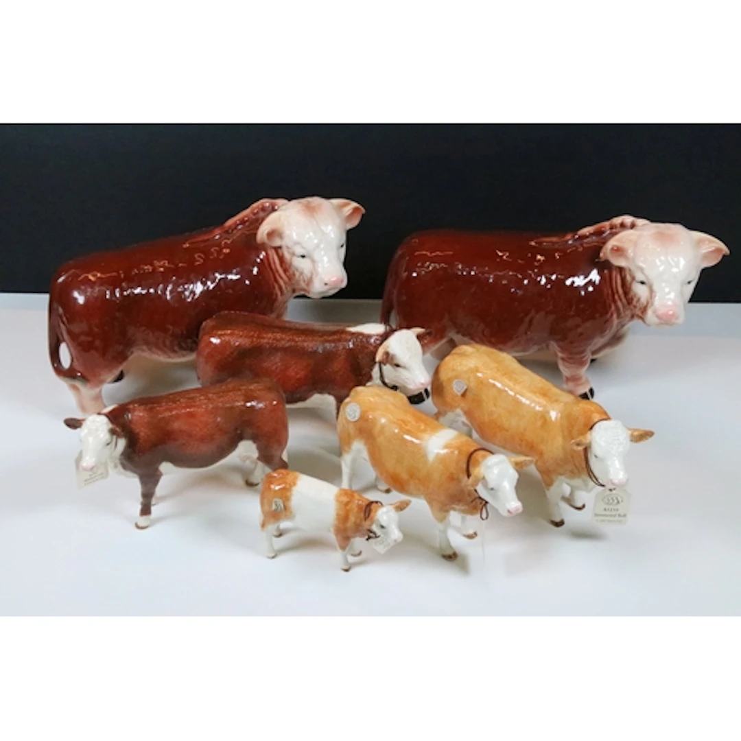 Group of five Border Fine Arts porcelain figures of bulls, o...
