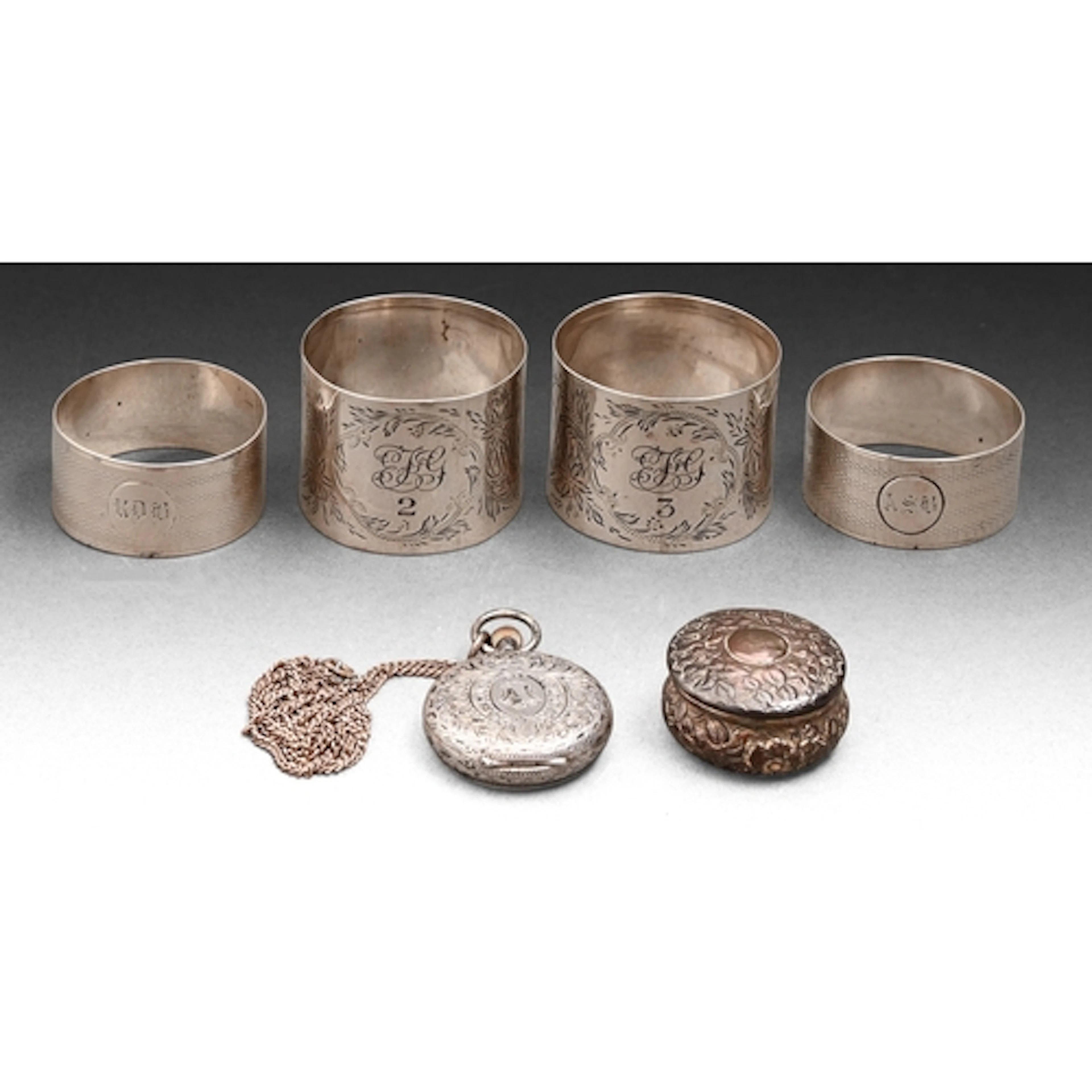 A pair of George V silver napkin rings, by Arthur Harris, Bi...