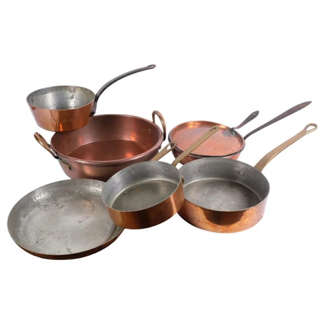 A variety of Antique and later copper pans, largest diameter...