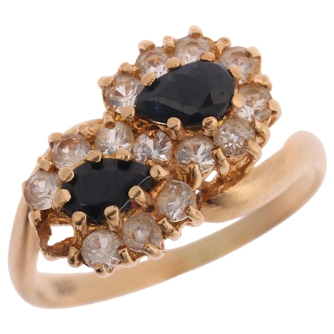 A 14ct gold blue and white sapphire double pear cluster ring...