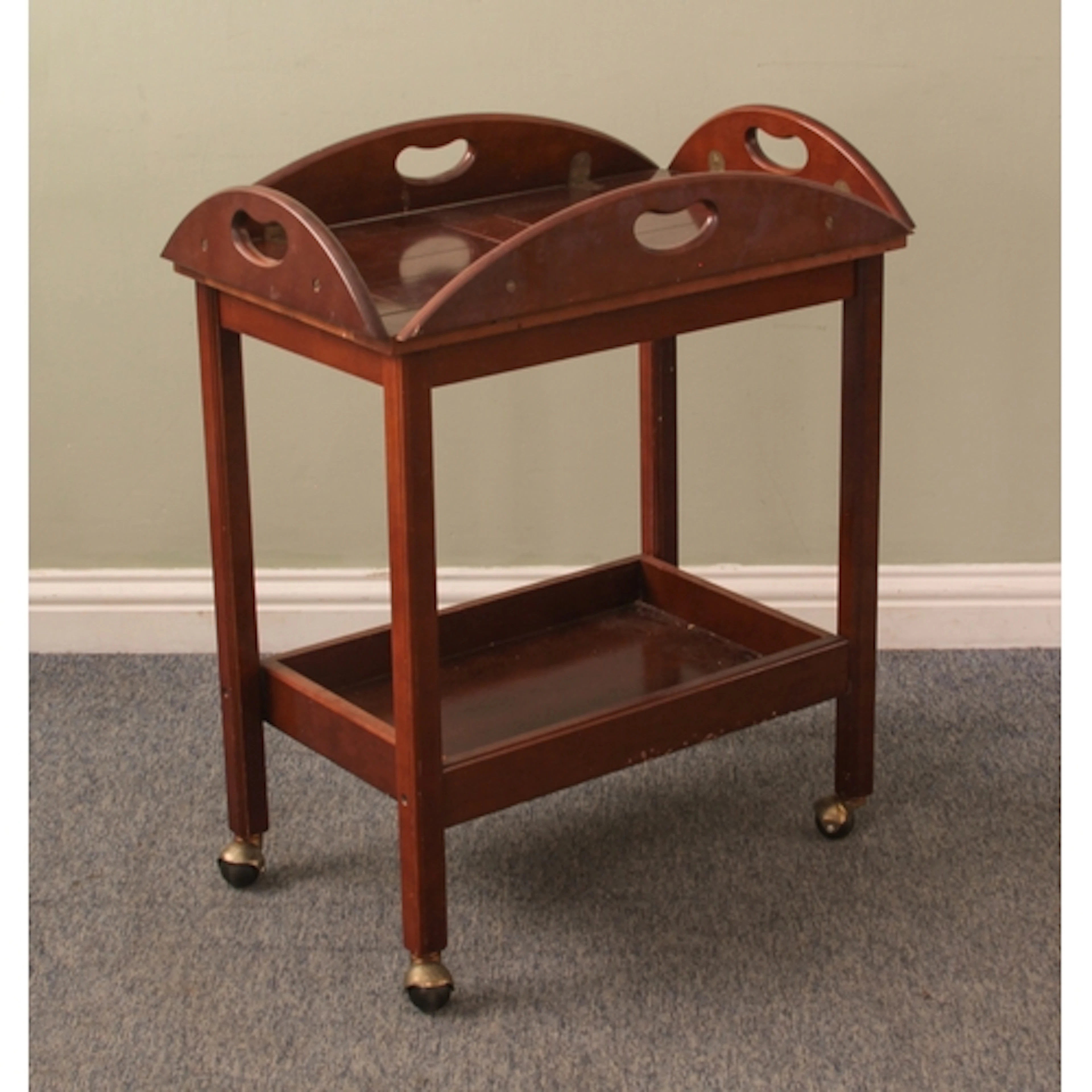 A Bombay Company drinks trolley - the detachable butler's tr...