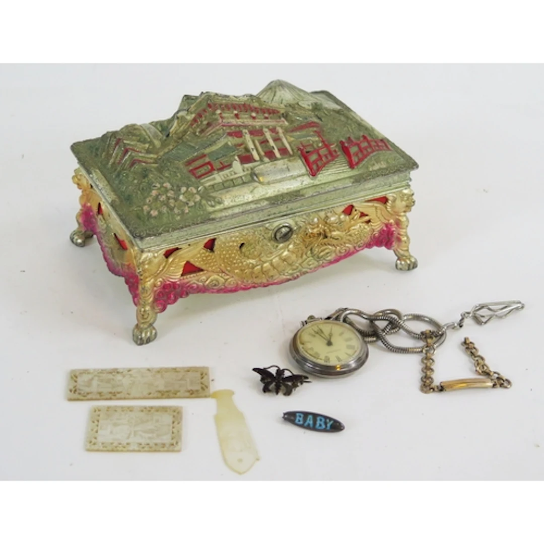 A Japanese metal jewellery box, containing mother-of-pearl g...