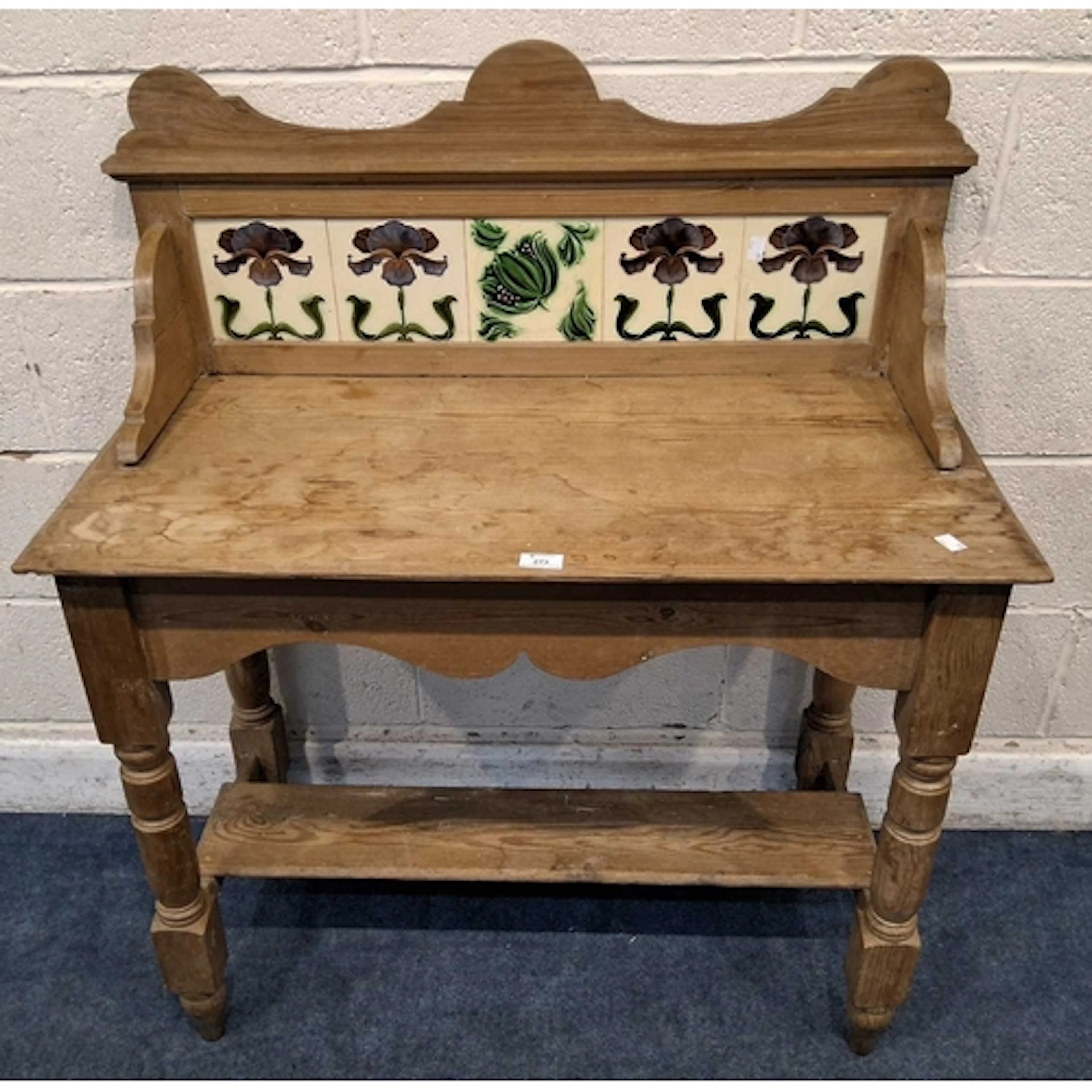 A 19TH CENTURY PINE WASHSTAND, with a raised tile back, bloc...