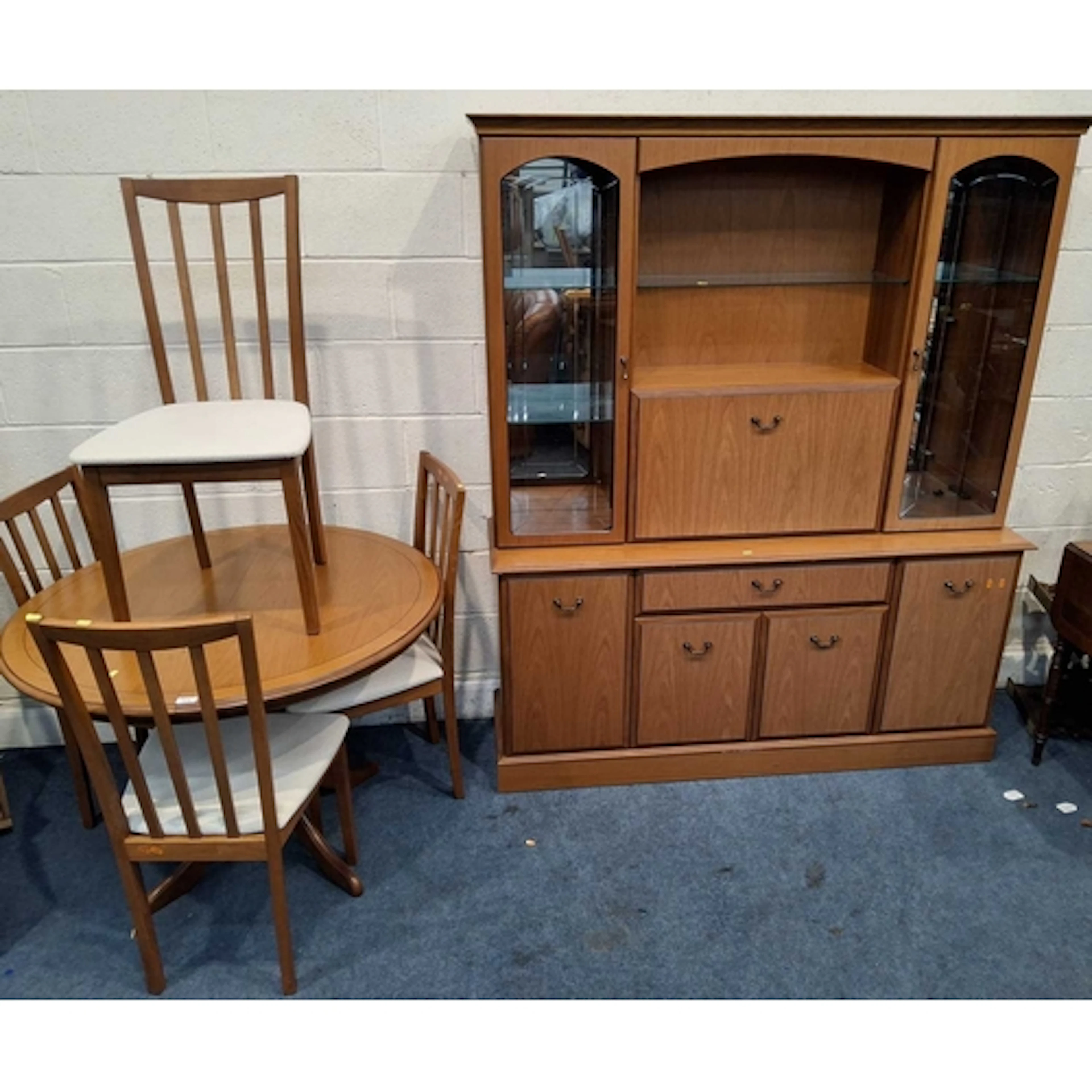 A MORRIS SIX PIECE DINING SUITE, comprising a small extendin...