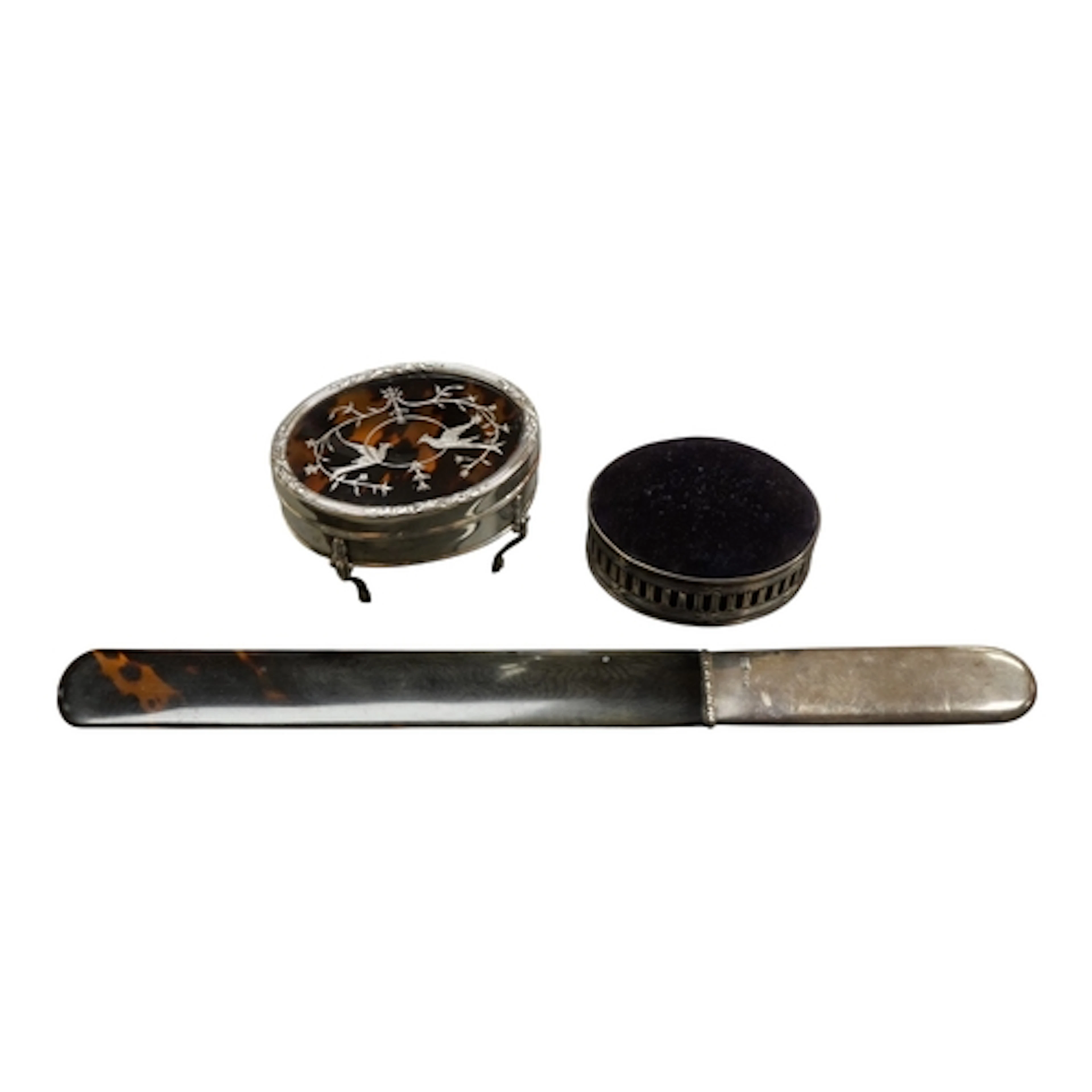 An Edwardian silver and tortoiseshell pique mounted oval tri...