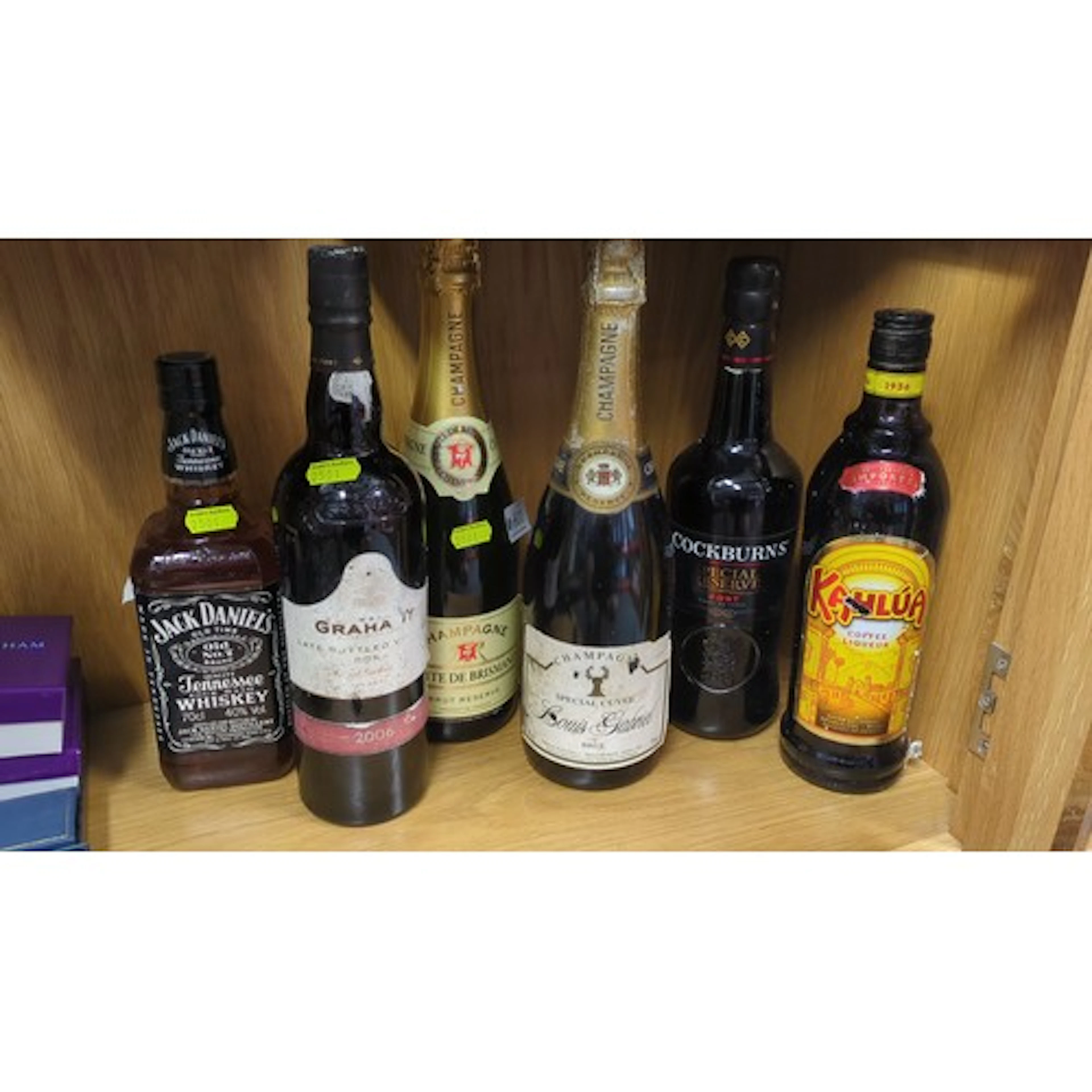 A group of assorted bottled spirits and sparkling wine, incl...