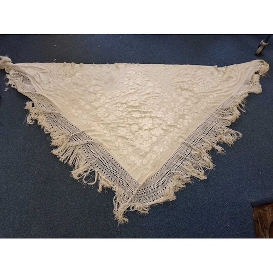 A VINTAGE HAND EMBROIDERED PIANO SHAWL, this heavy silk shaw...