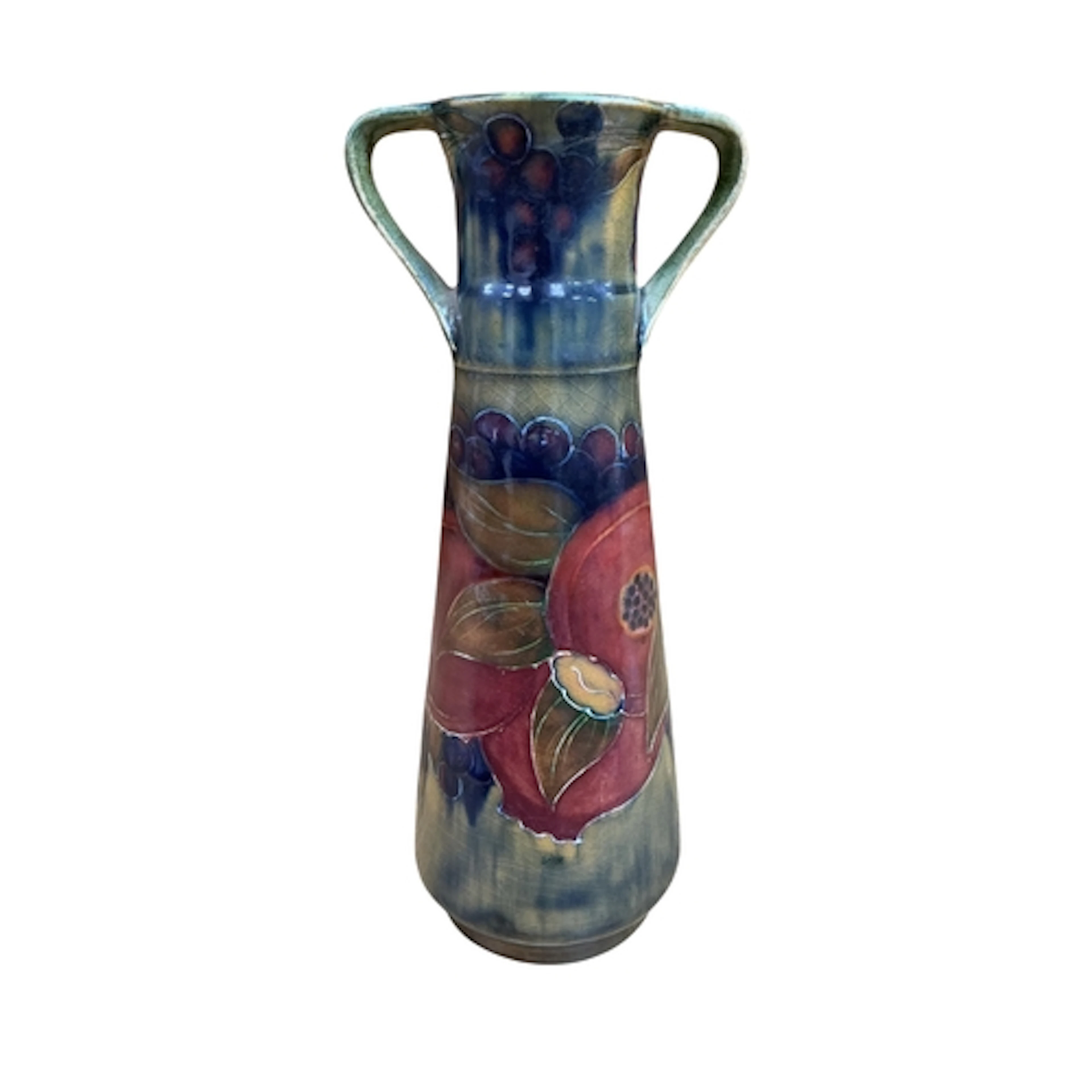 A Moorcroft pomegranate pattern twin handled jug, signed to ...