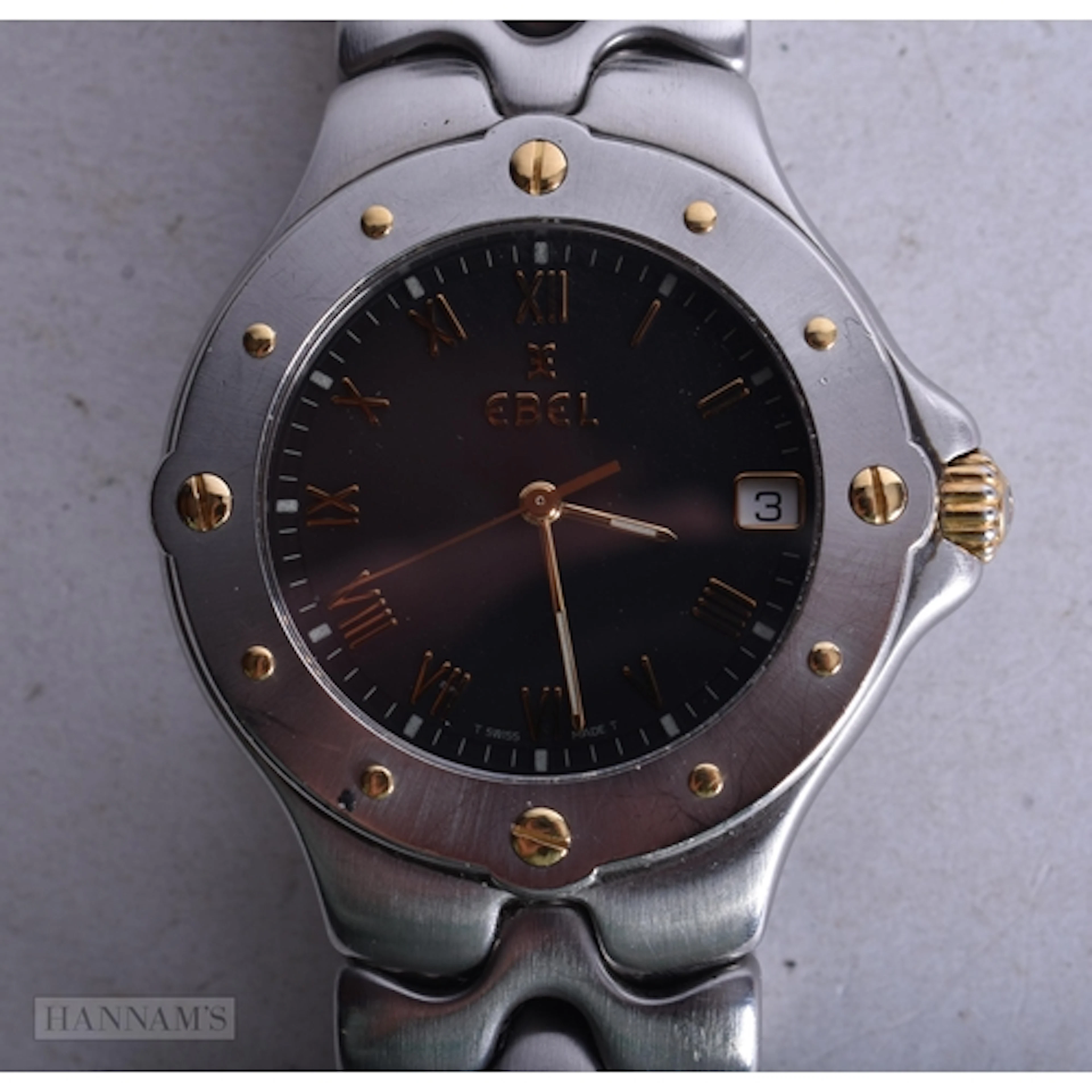 AN EBEL WRIST WATCH. Running. 3.5 cm wide.