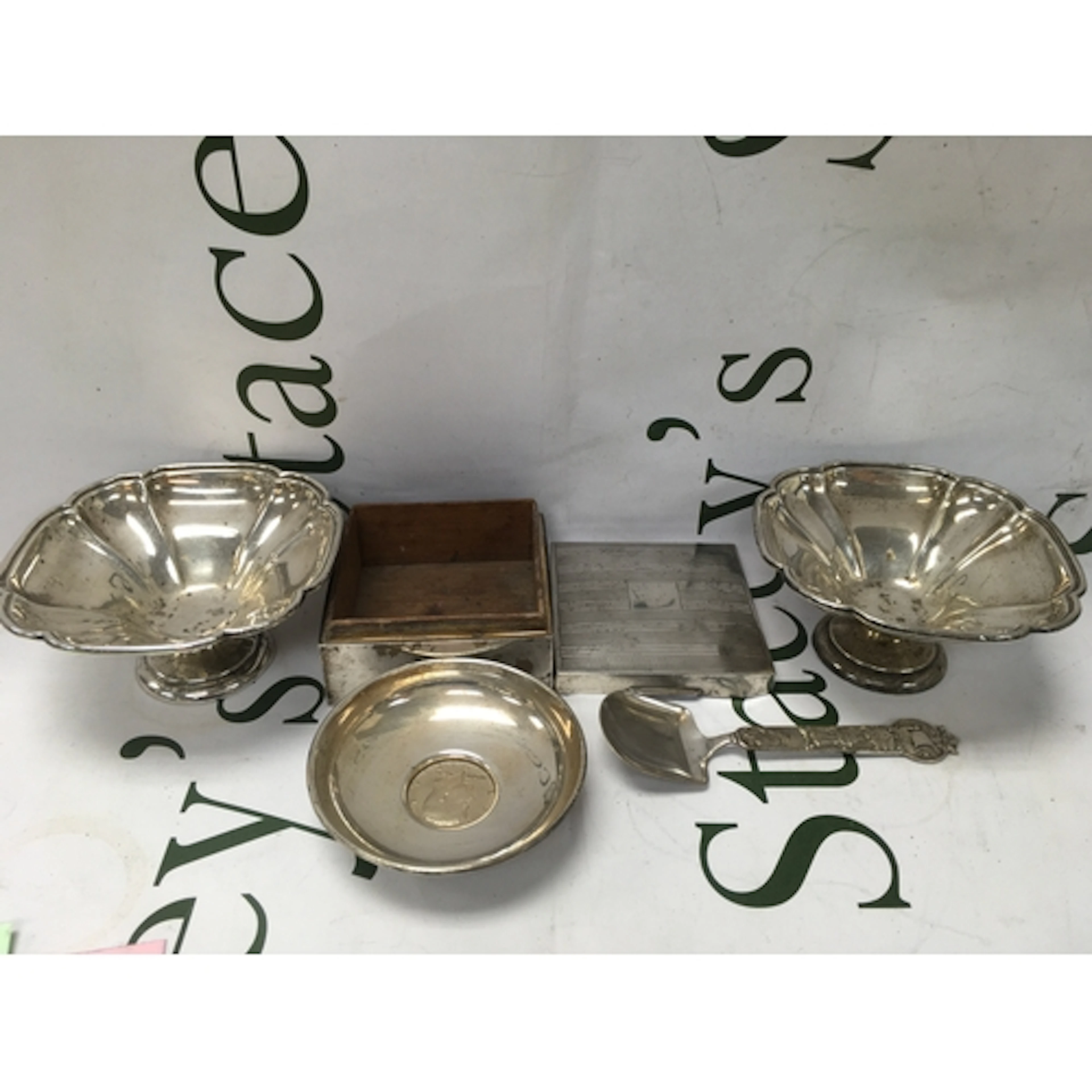 Two silver dishes, an American Silver dish with a coin inset...
