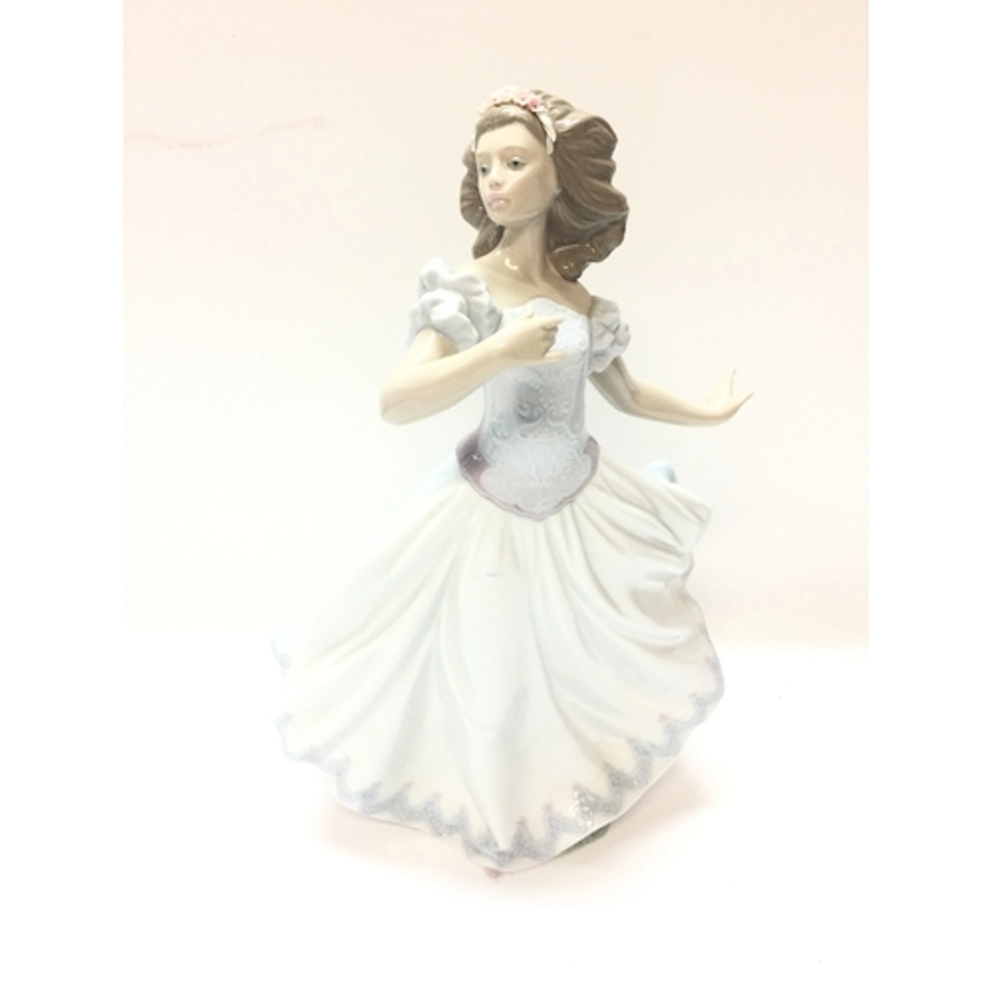 Lladro “sweet sixteen” glazed porcelain figurine...