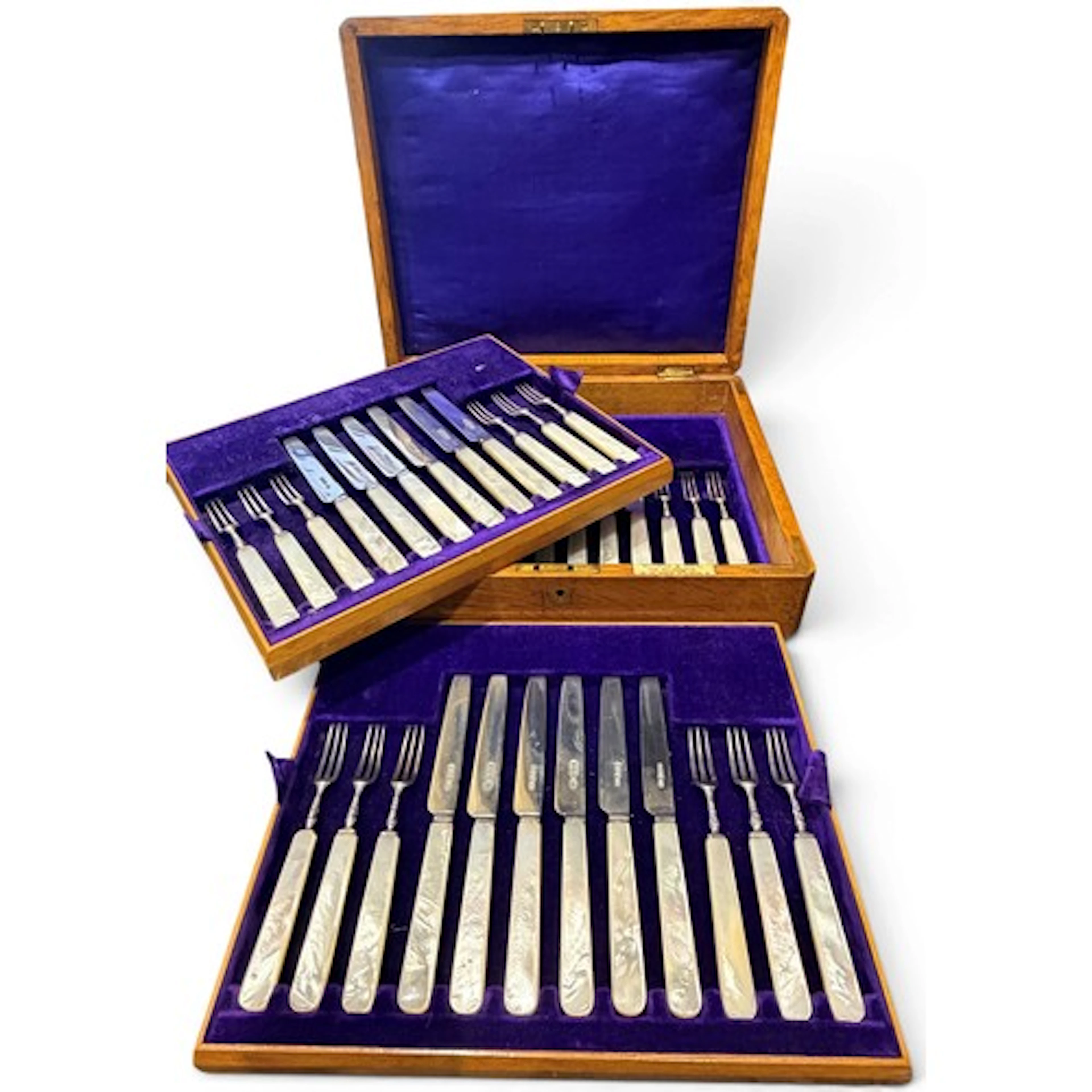 A cased set of eighteen George V silver and mother-of-pearl ...