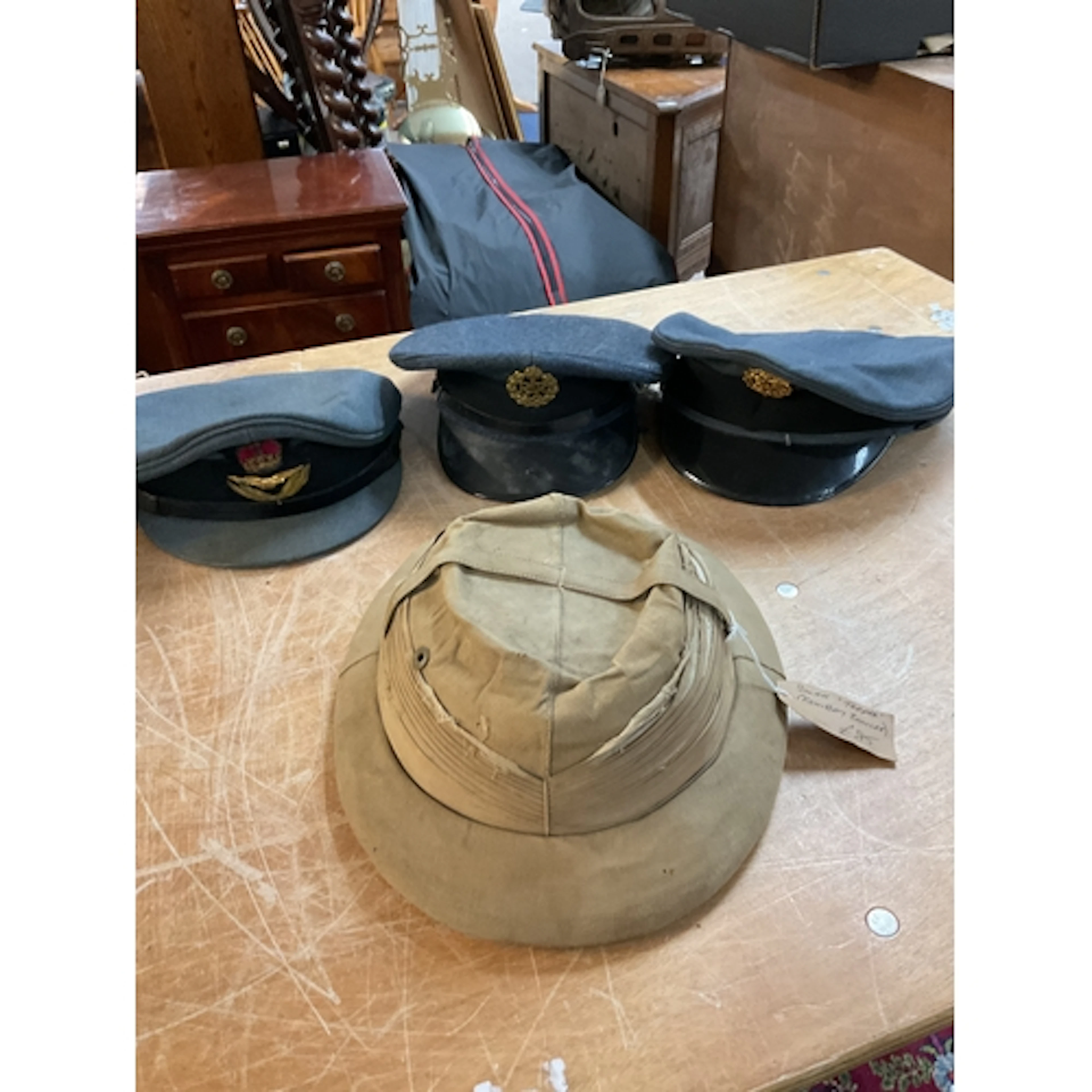 Three QEIIR RAF Officers caps and a solar Toppee.
