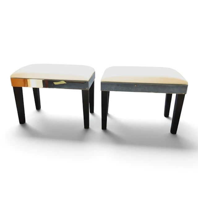 A pair of contemporary Art Deco style piano stools with whit...