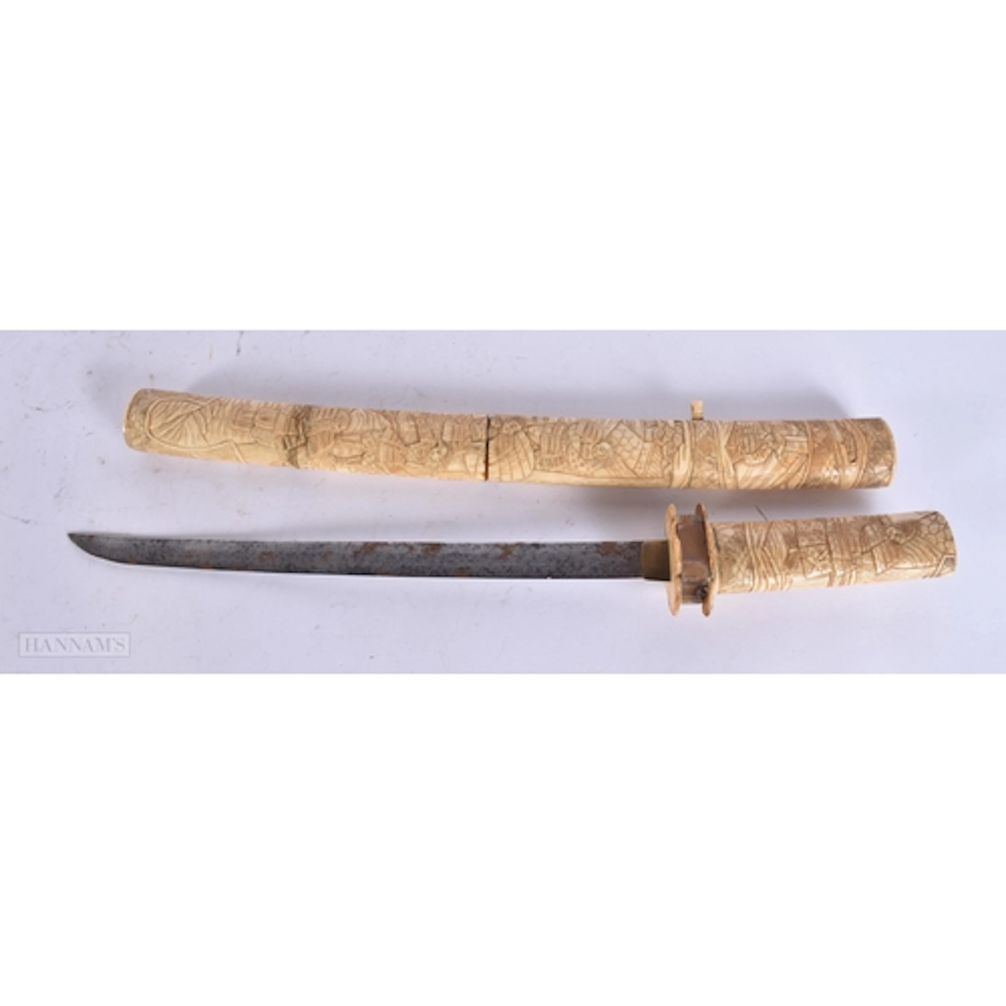 A 19TH CENTURY JAPANESE MEIJI PERIOD CARVED BONE SWORD decor...