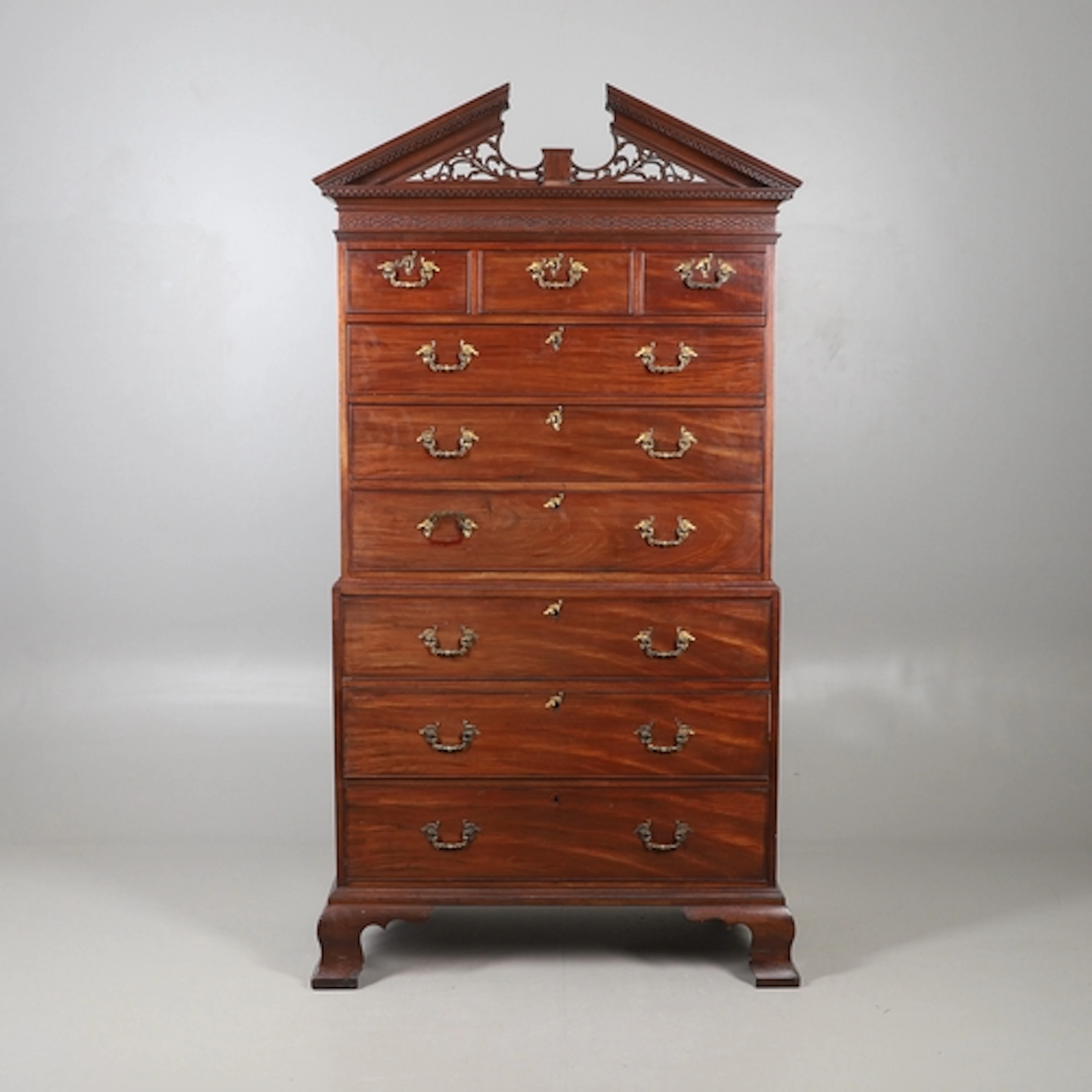 A GEORGE III MAHOGANY TALLBOY, ATTRIBUTABLE TO GILLOW & CO. ...