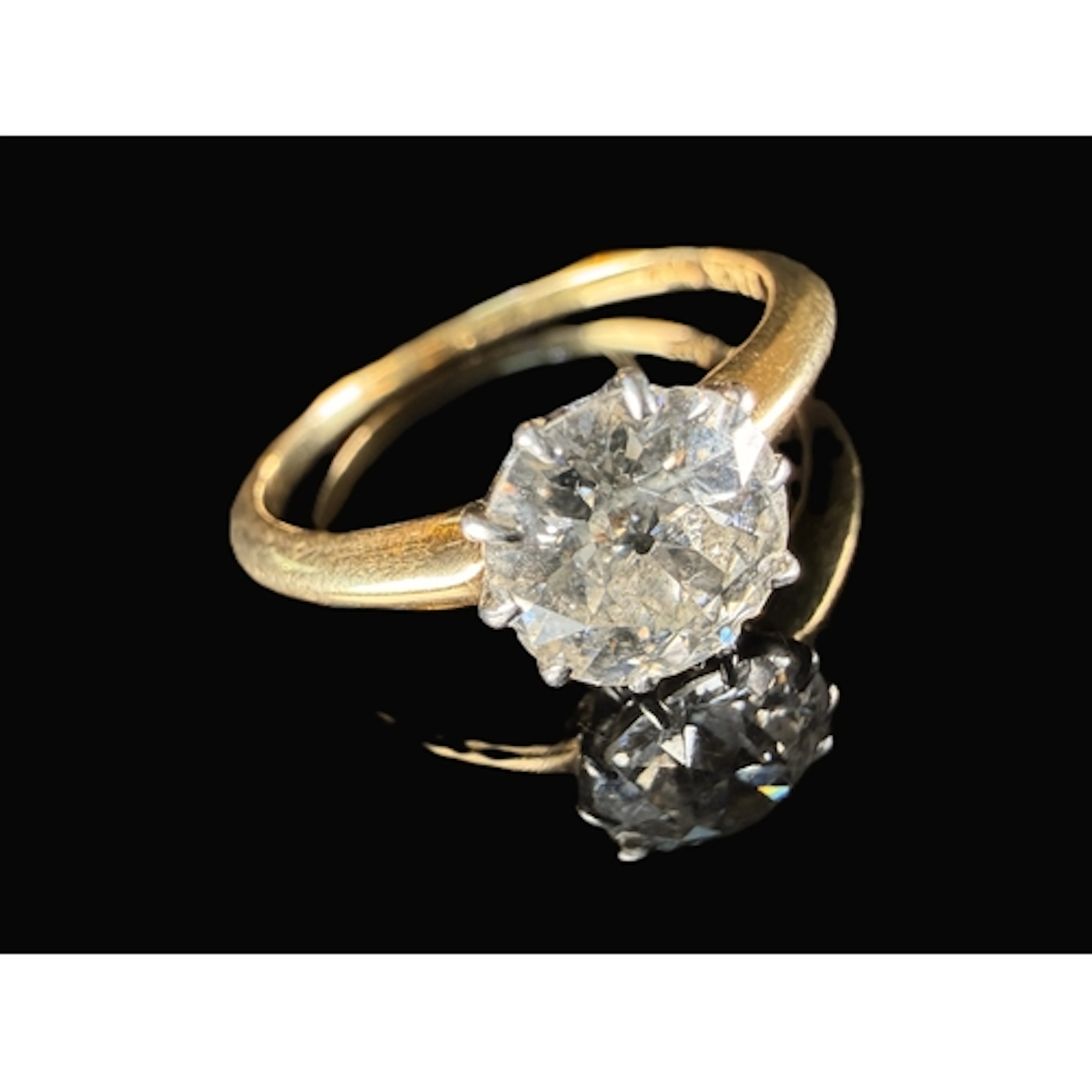 An 18ct gold solitaire diamond ring set with brilliant cut n...