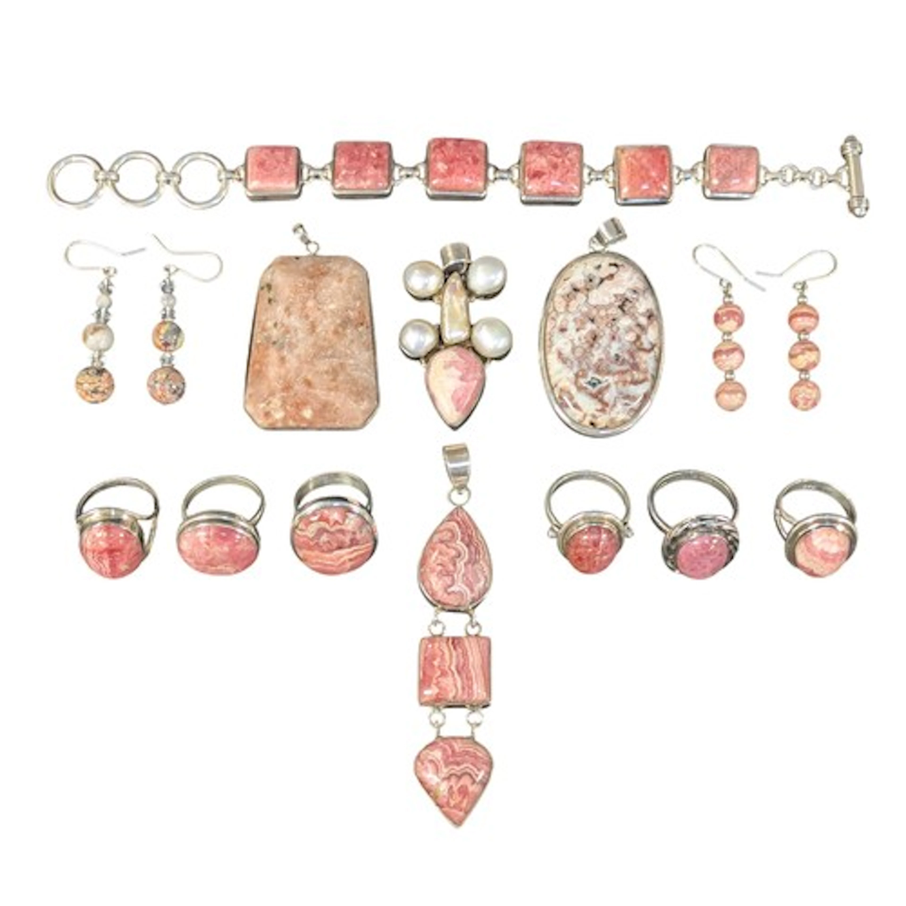 A rhodochrosite and silver metal six panel bracelet, stamped...