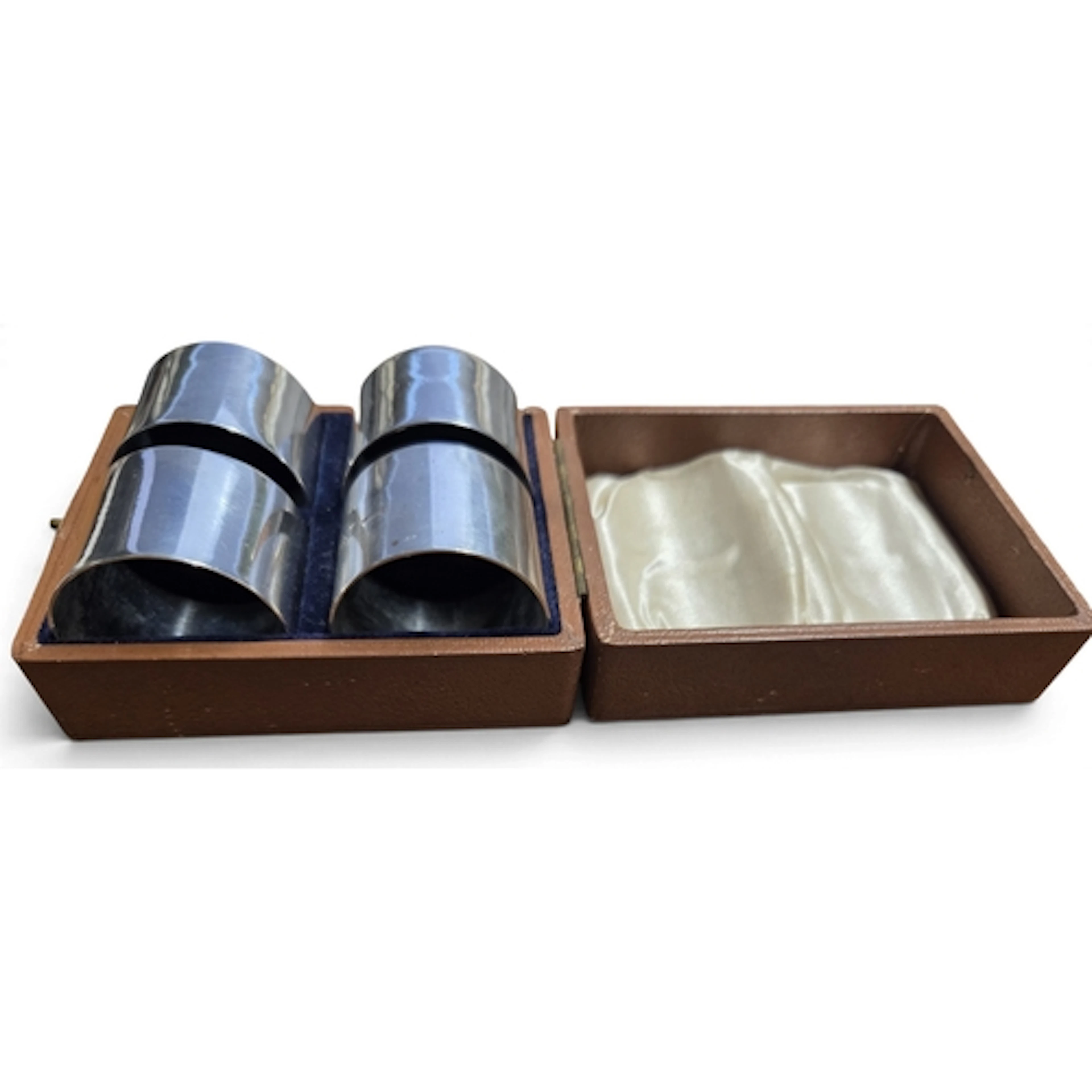 A good boxed set of Chester Silver Napkin Rings, Henry Griff...