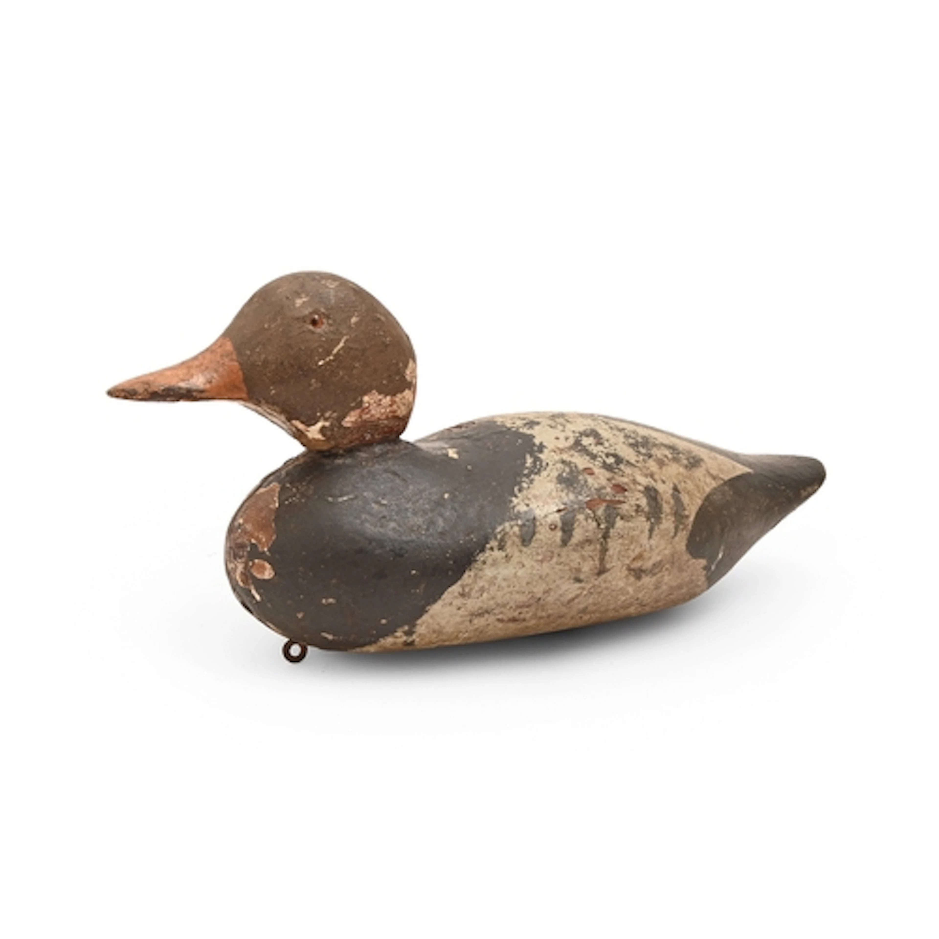 A painted wood duck decoy, early 20th c, with glass eyes, th...