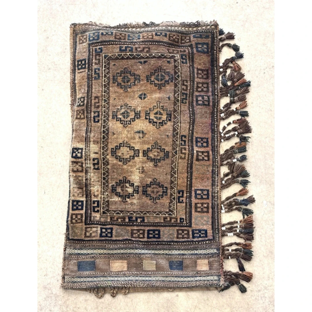 A handwoven Baluch Persian Tribal saddle bag, with tradition...