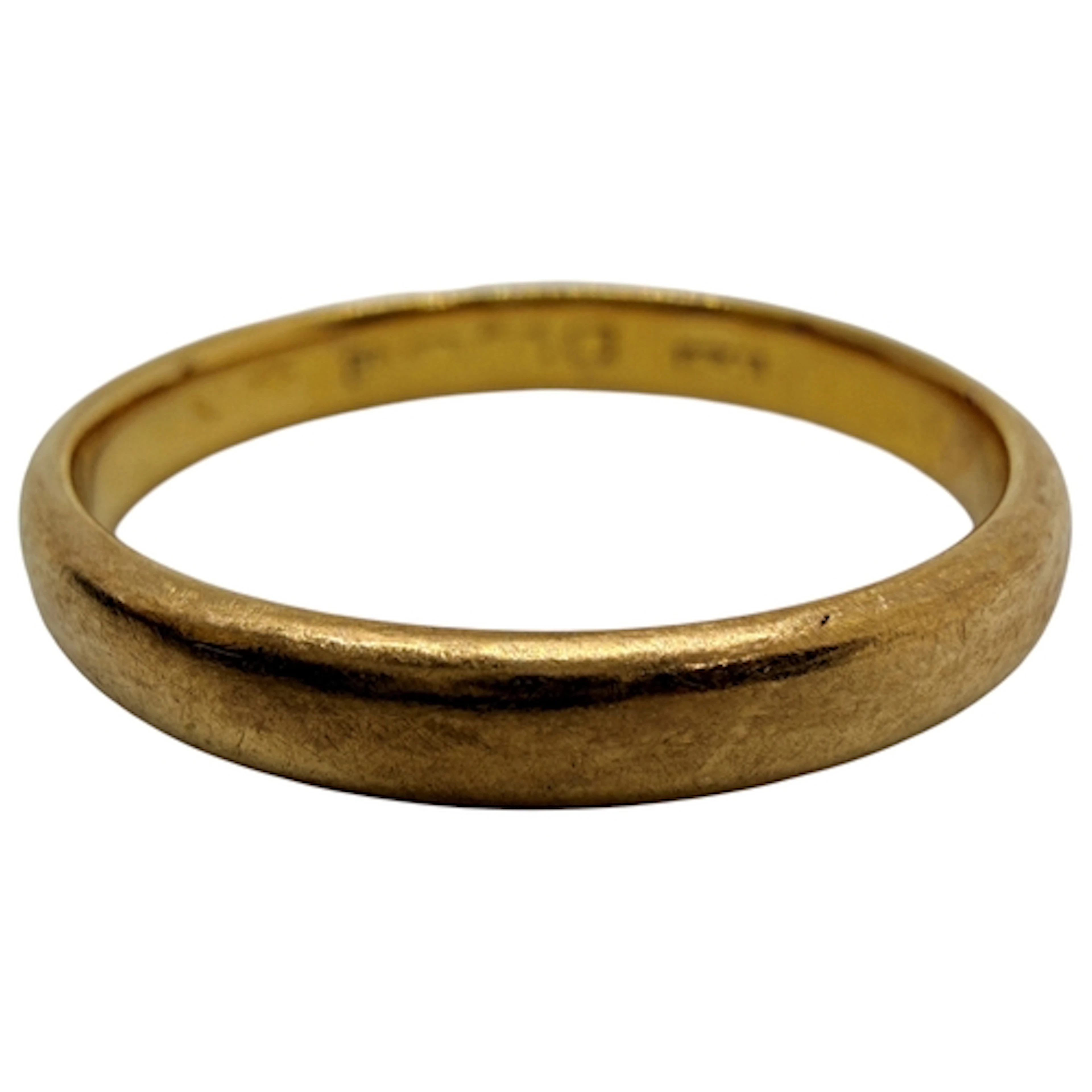 A gold wedding band, marks rubbed, probably 22ct, size O, 3....