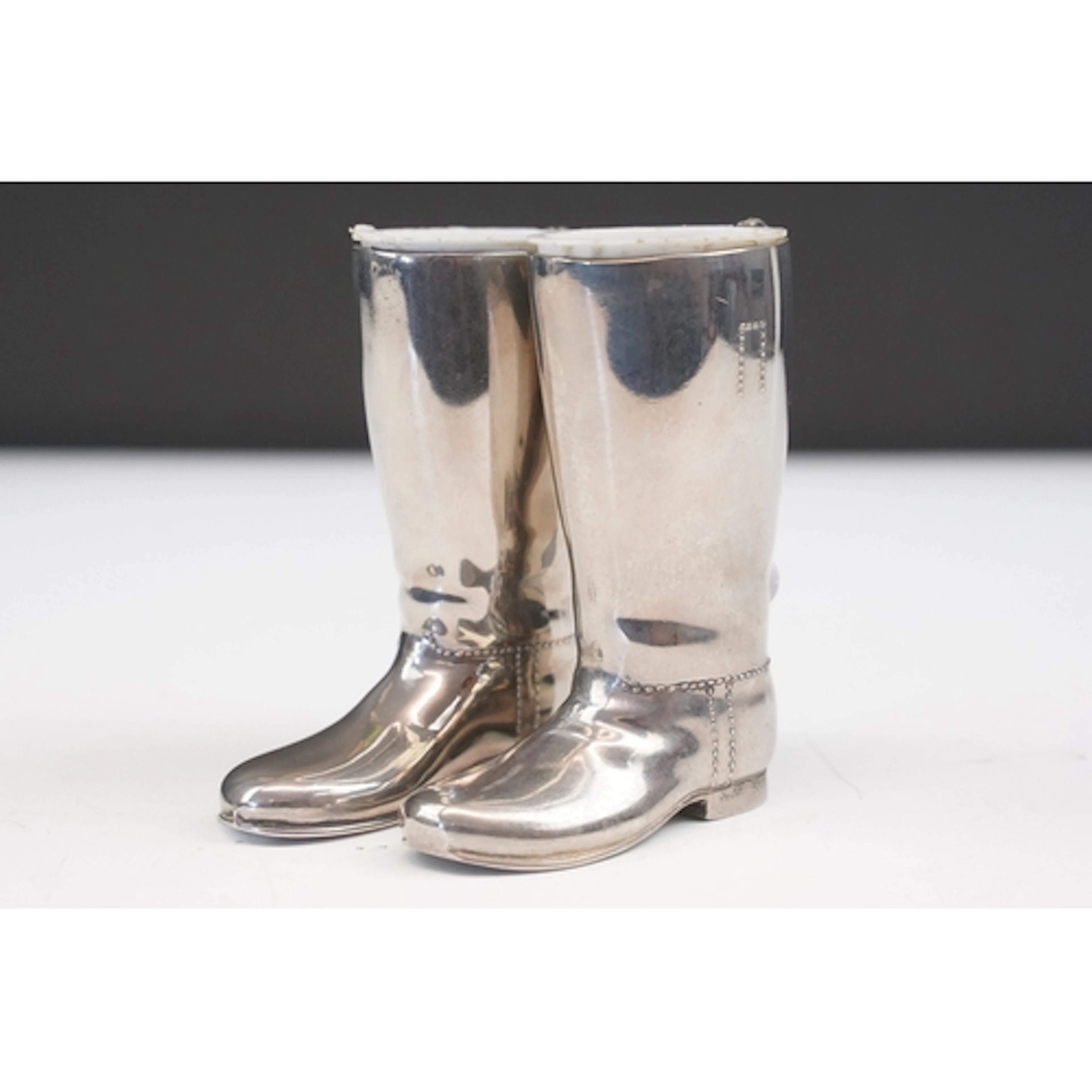 Pair of silver plated novelty riding boot stirrup cups, impr...