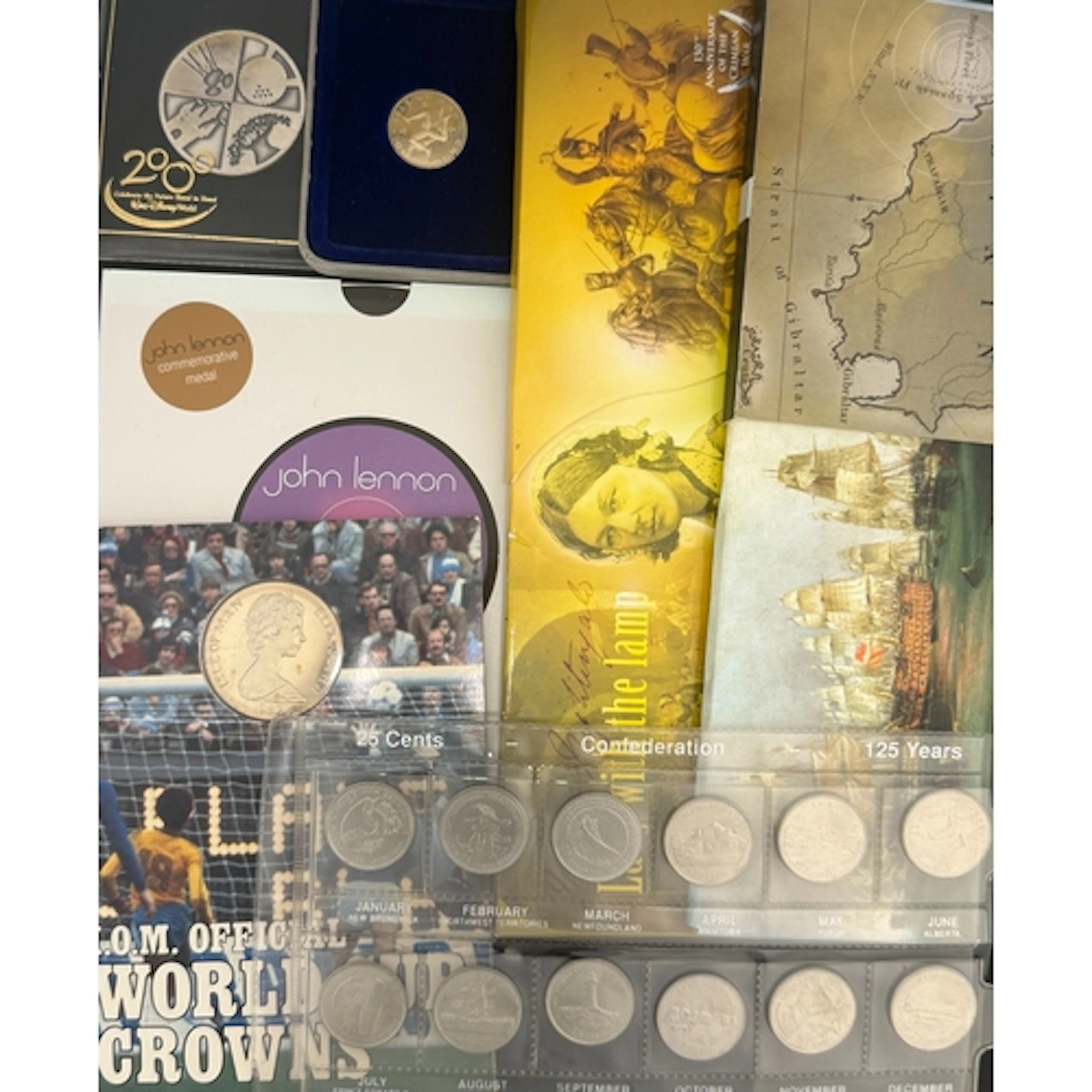 A group of over 30 World commemorative cupro-nickel coin set...